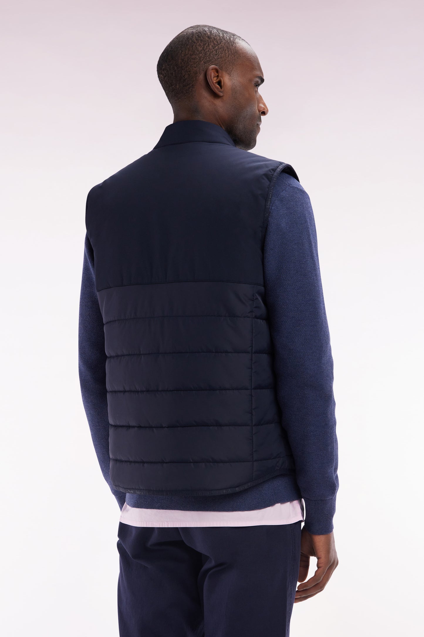 Navy bi-material sleeveless down jacket