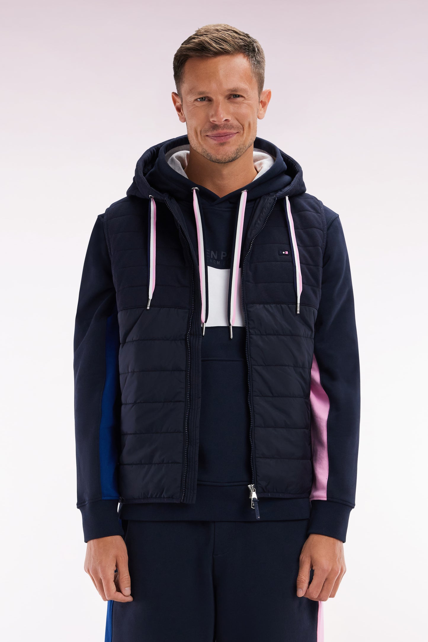 Sleeveless navy bimaterial down jacket with hood