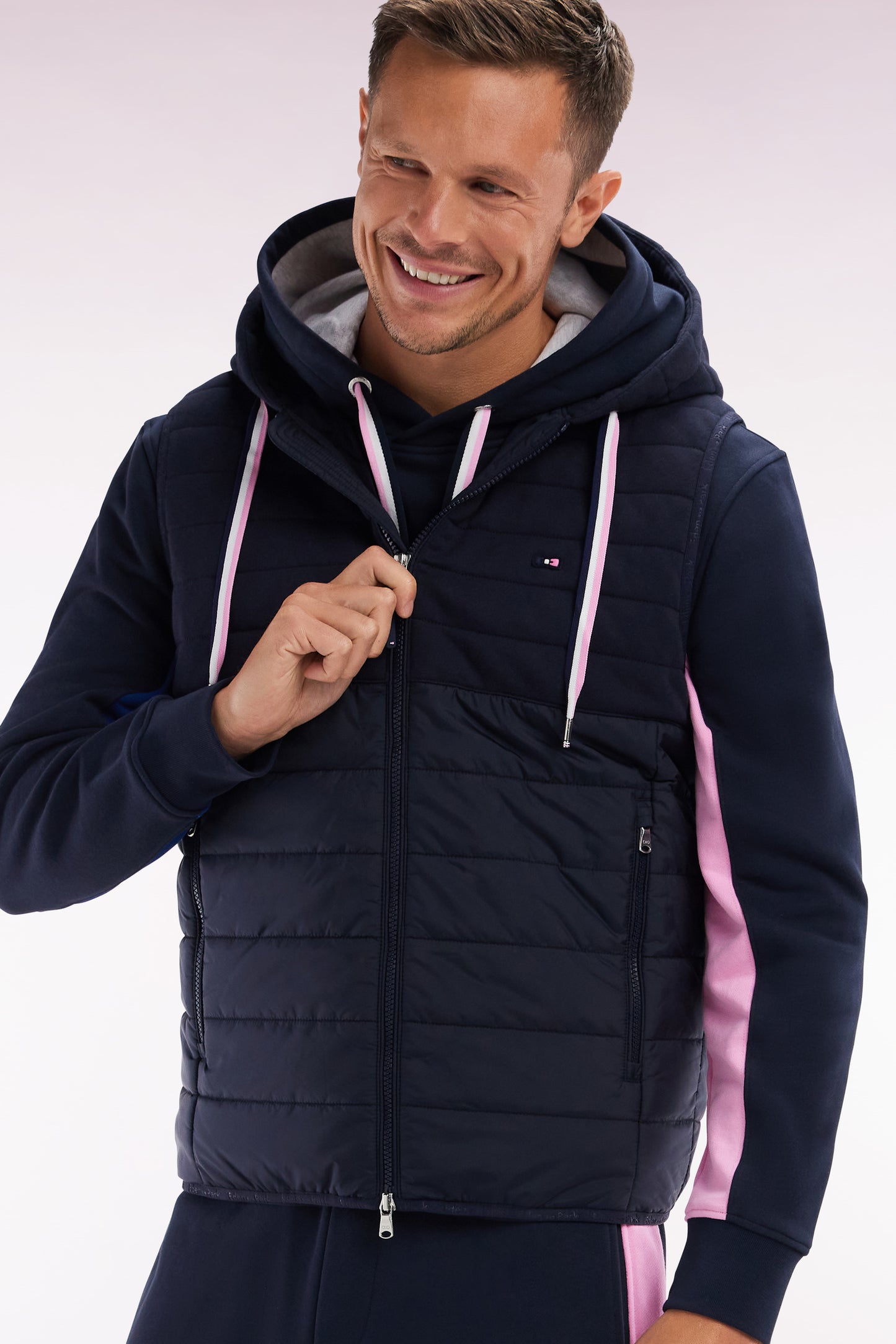 Sleeveless navy bimaterial down jacket with hood