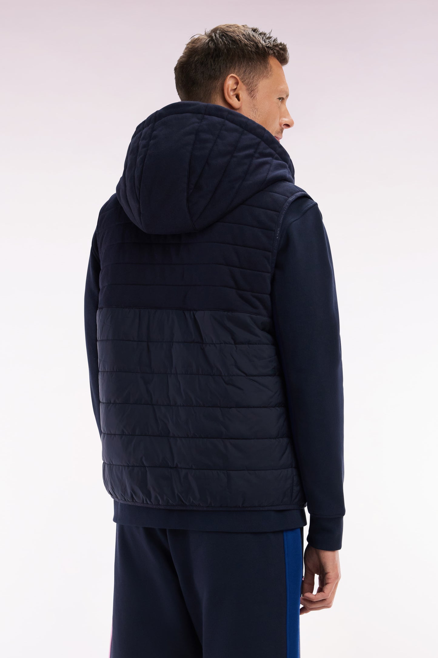 Sleeveless navy bimaterial down jacket with hood