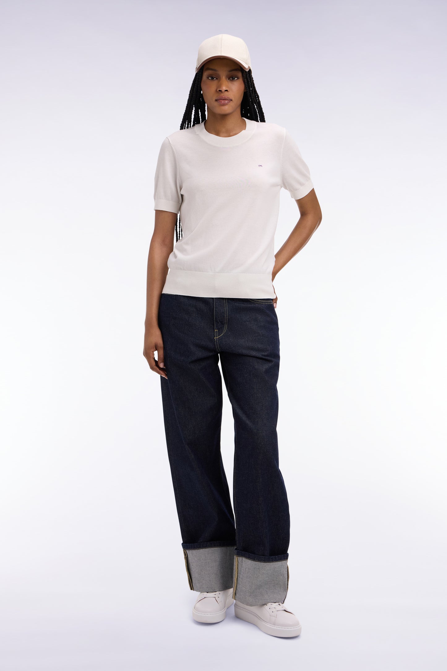 Jean en denim brut coupe droite large à revers cousu