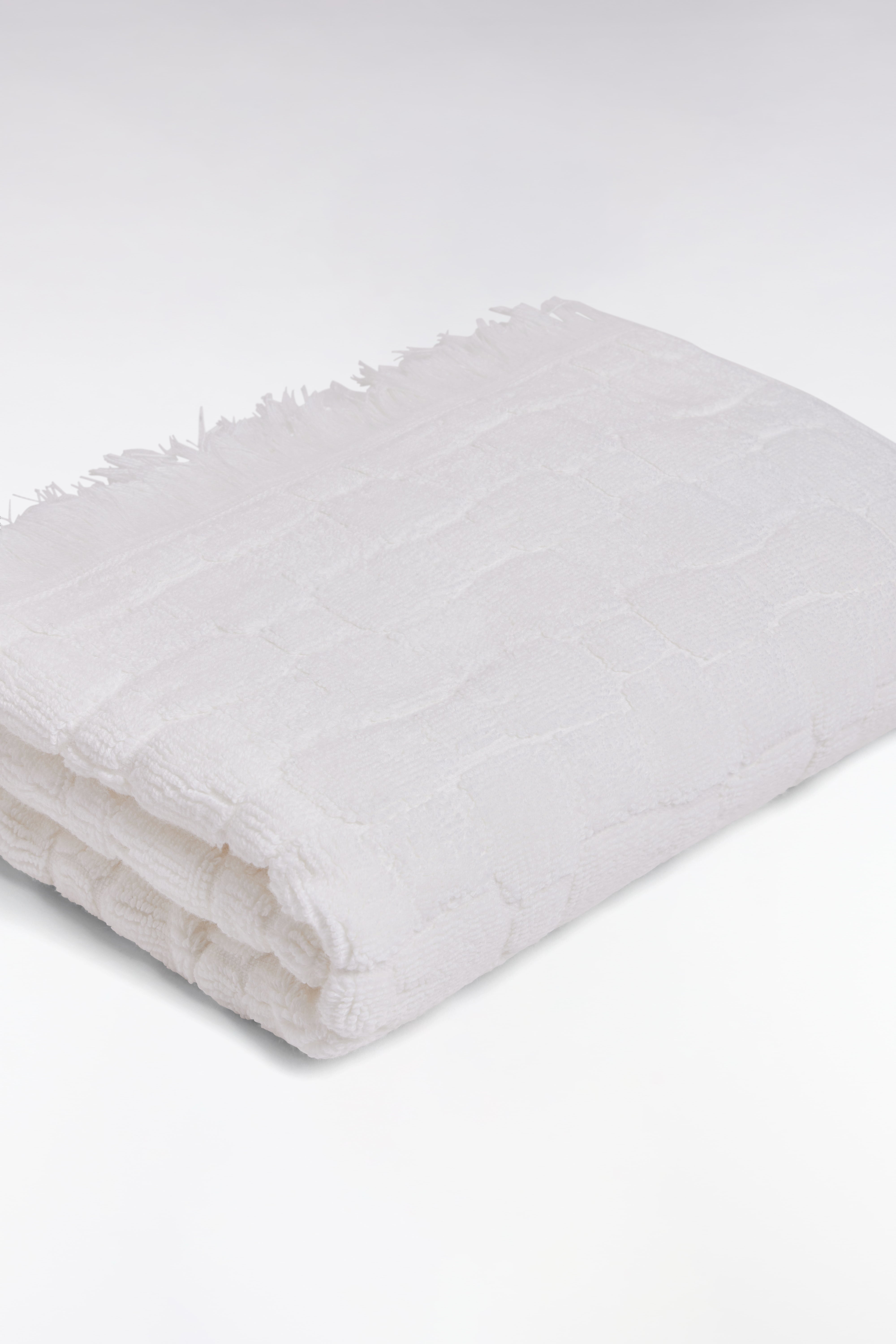 Serviette de toilette en coton blanc à micromotifs nœuds papillon