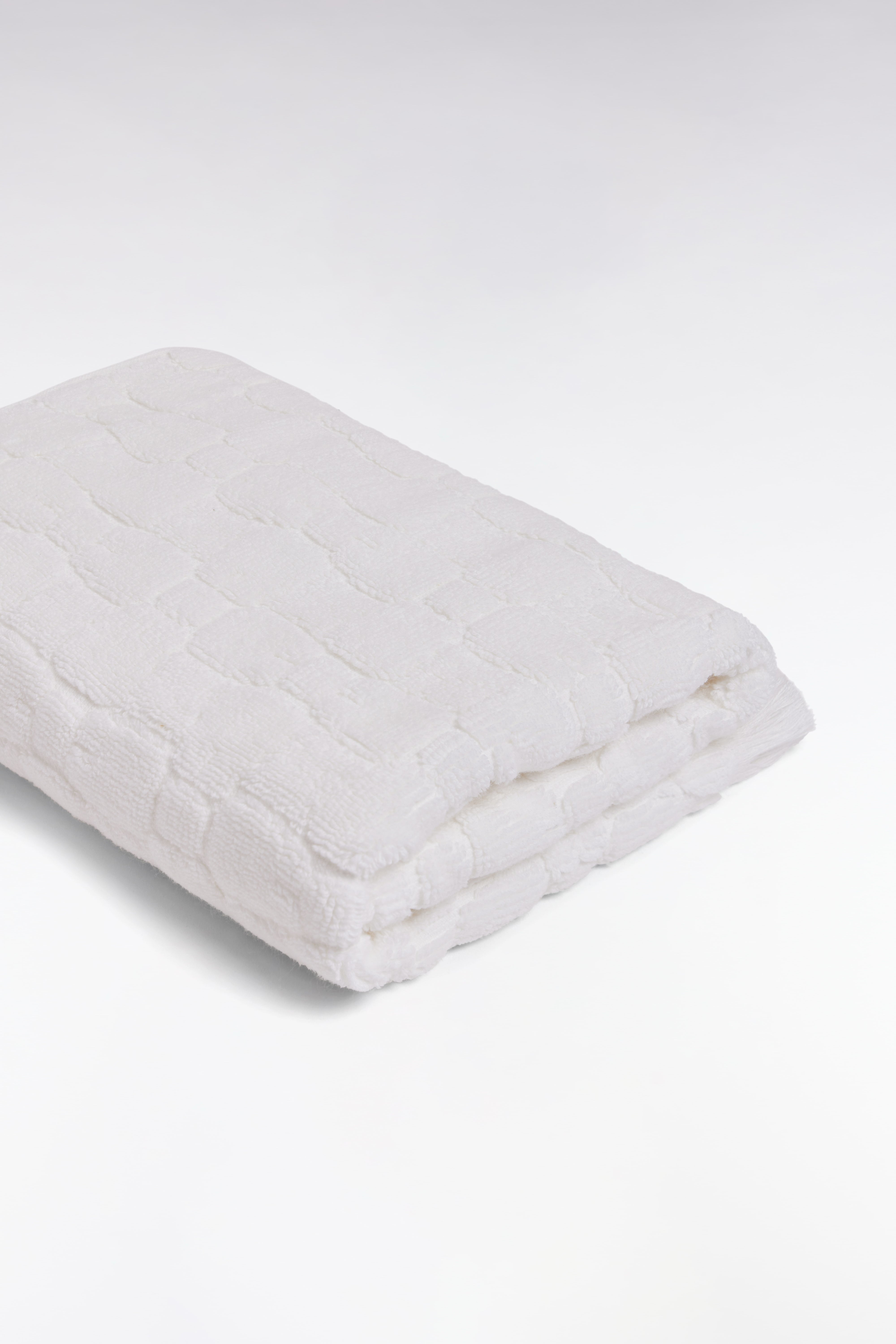 Serviette de toilette en coton blanc à micromotifs nœuds papillon