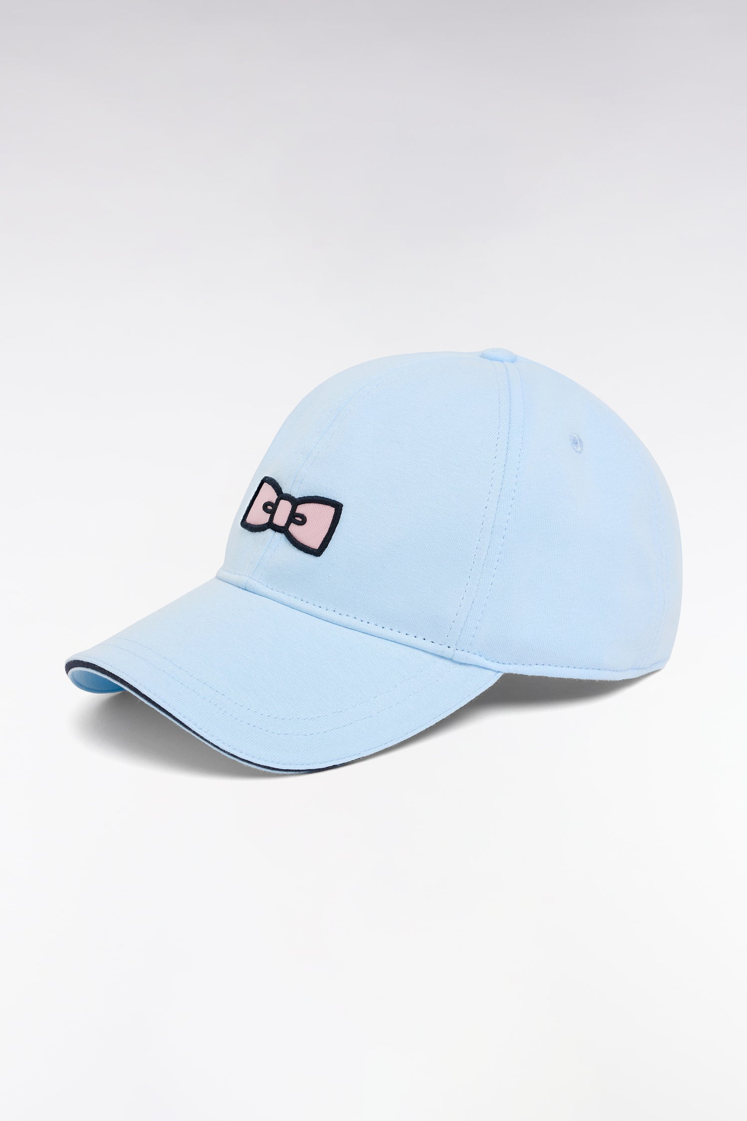 Kappe aus Baumwolle Himmelblau Stickerei Schleife rosa