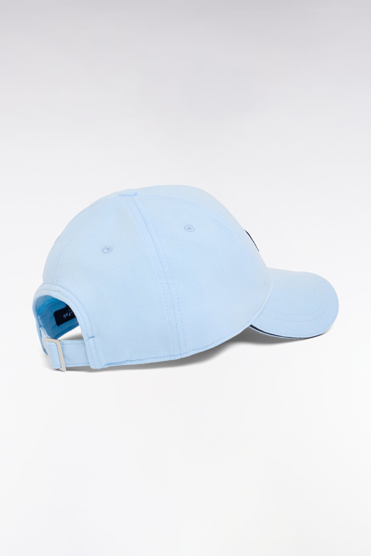 Casquette en coton ciel broderie nœud papillon rose