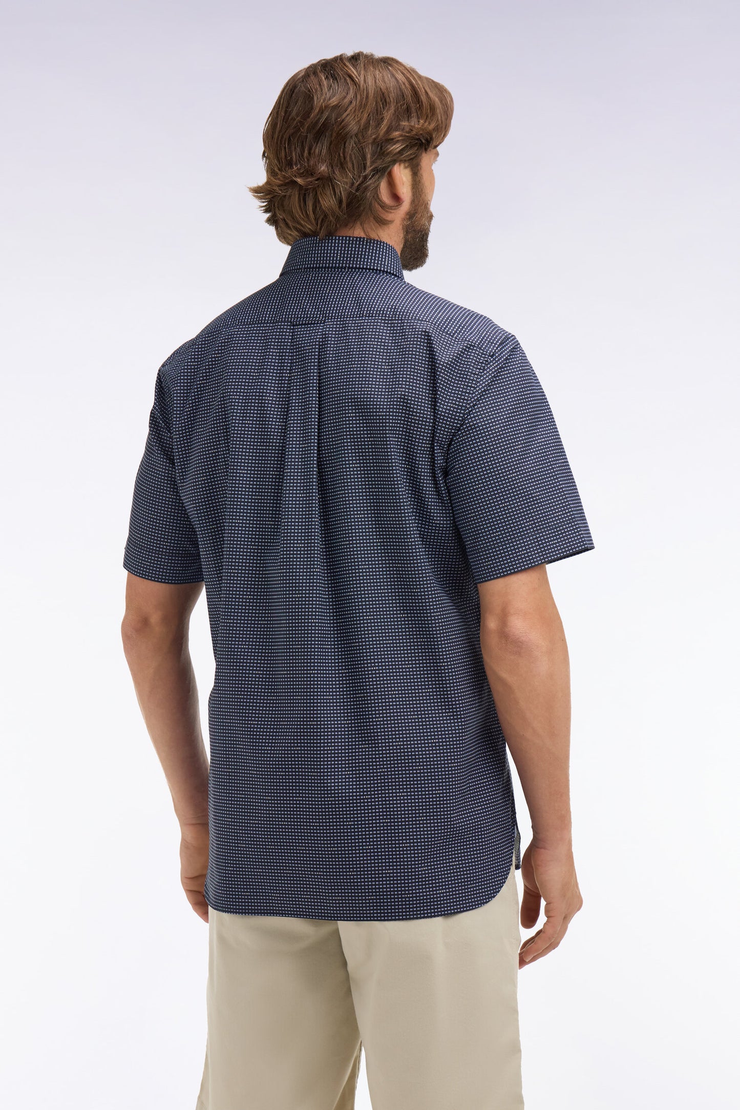 Short-sleeved navy cotton shirt with sky blue micro-patterns