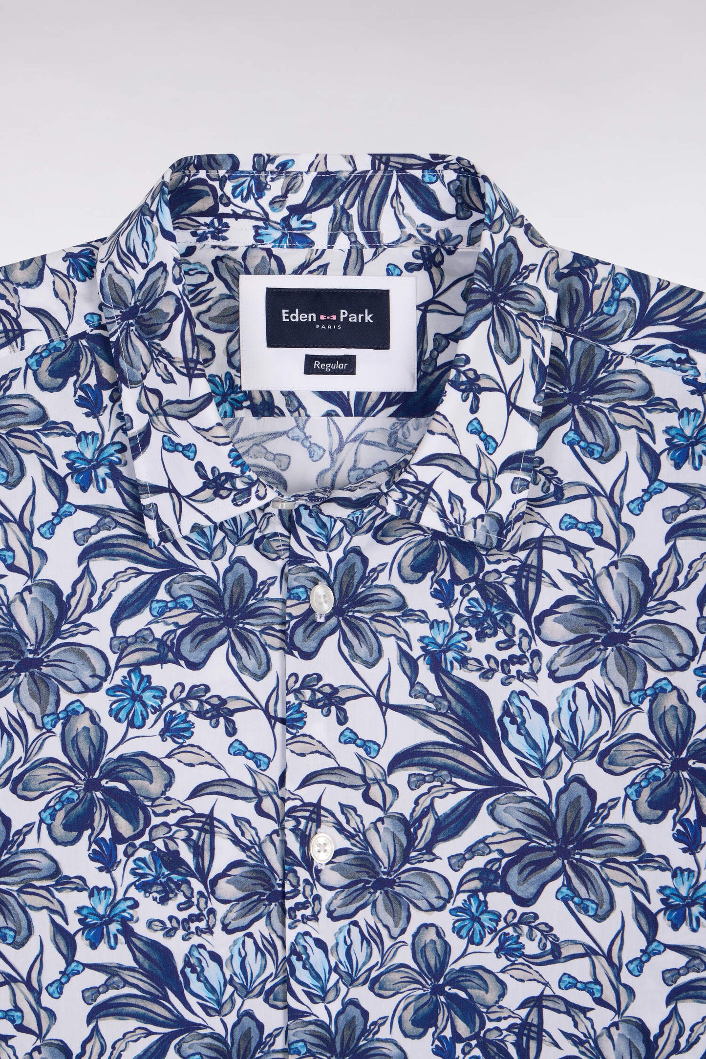 Short-sleeved shirt in navy cotton poplin with floral pattern