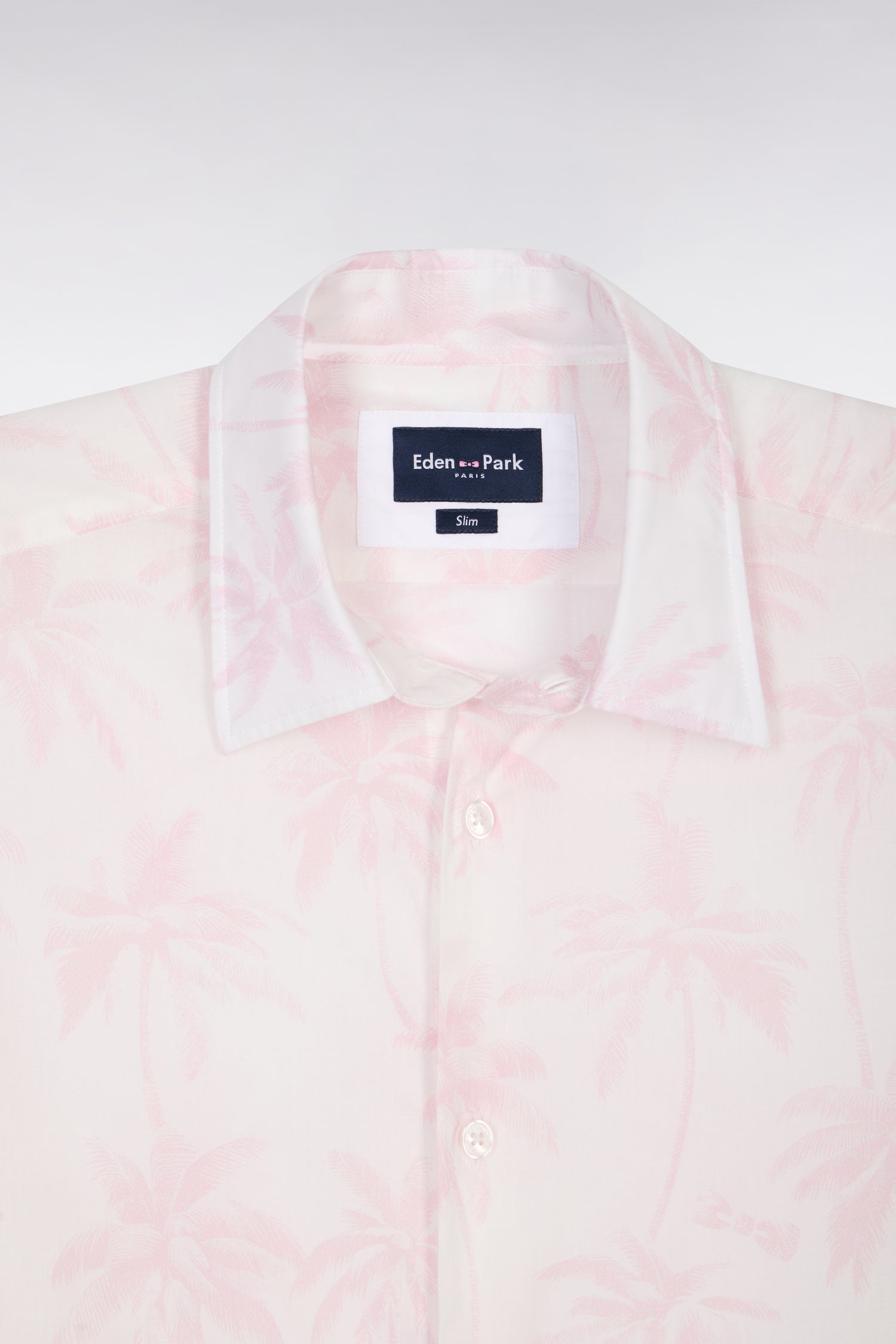 Chemise à manches courtes en coton rose imprimé palmiers coupe slim