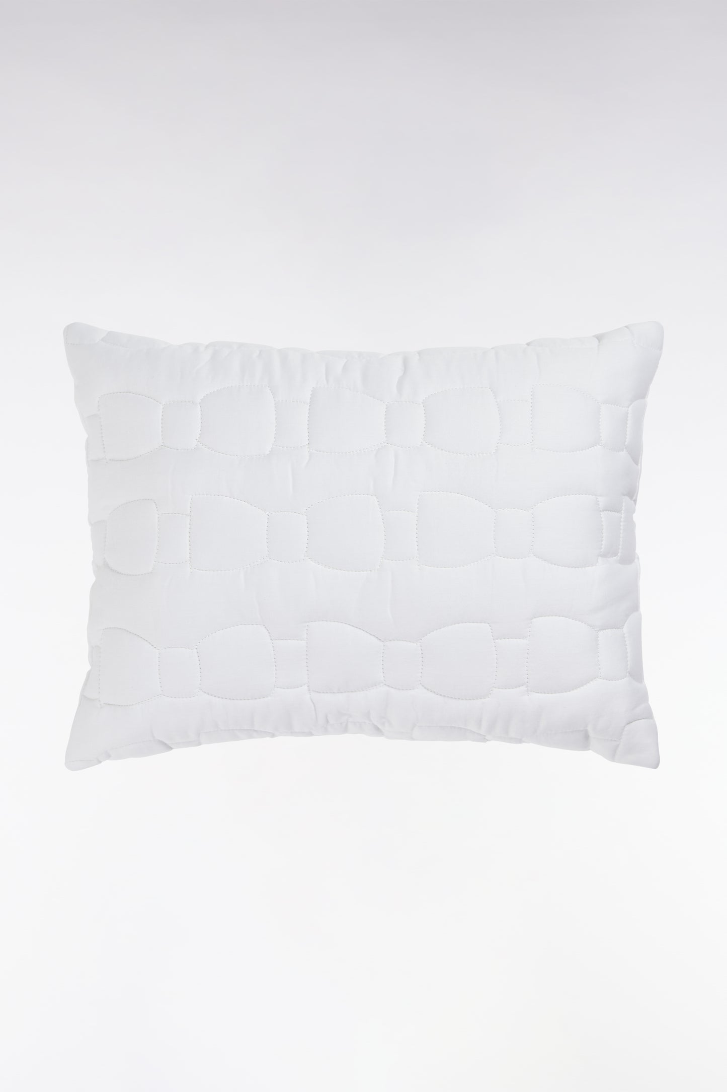 Coussin en coton blanc
