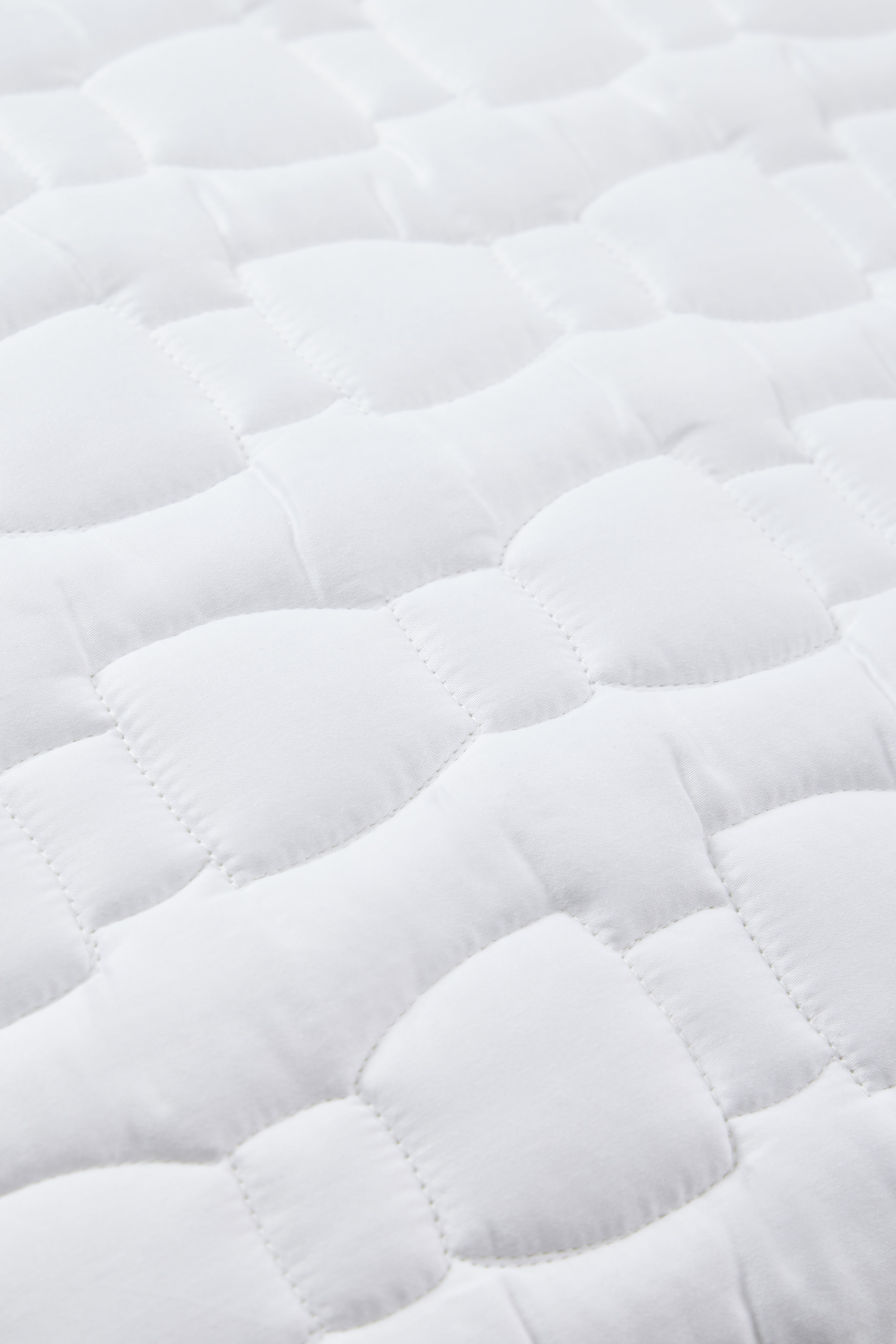 Taies d'oreiller en satin de coton blanc matelassé