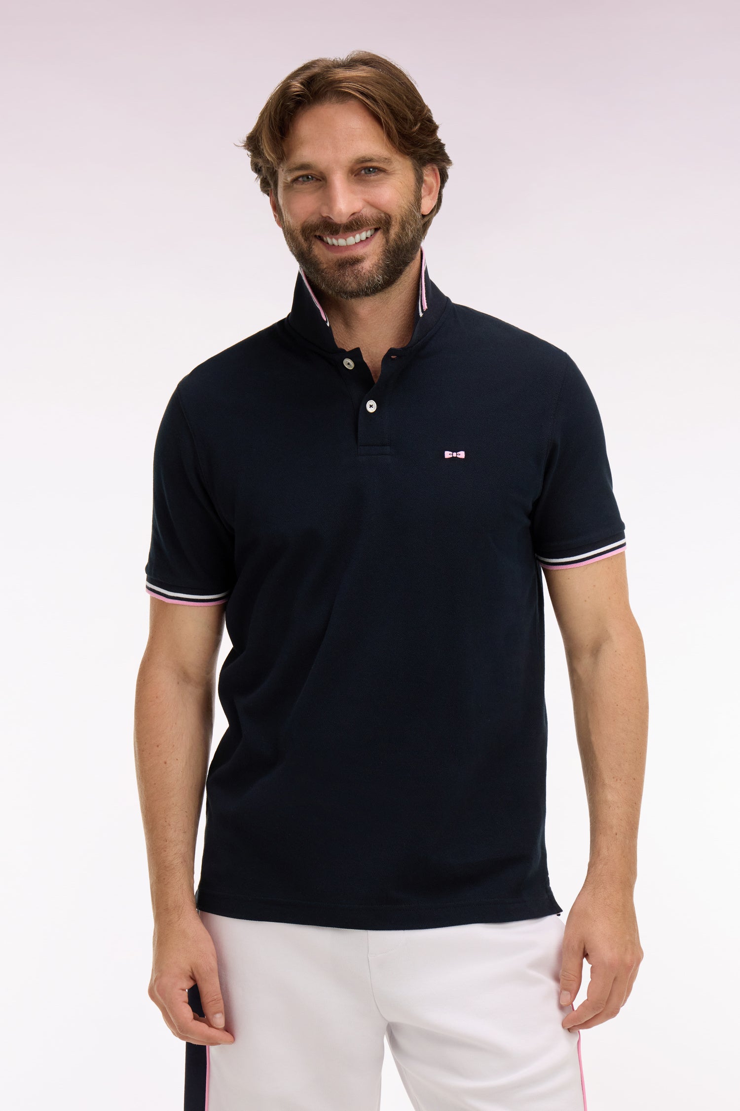 Polo manches courtes en coton marine détails rayés coupe regular