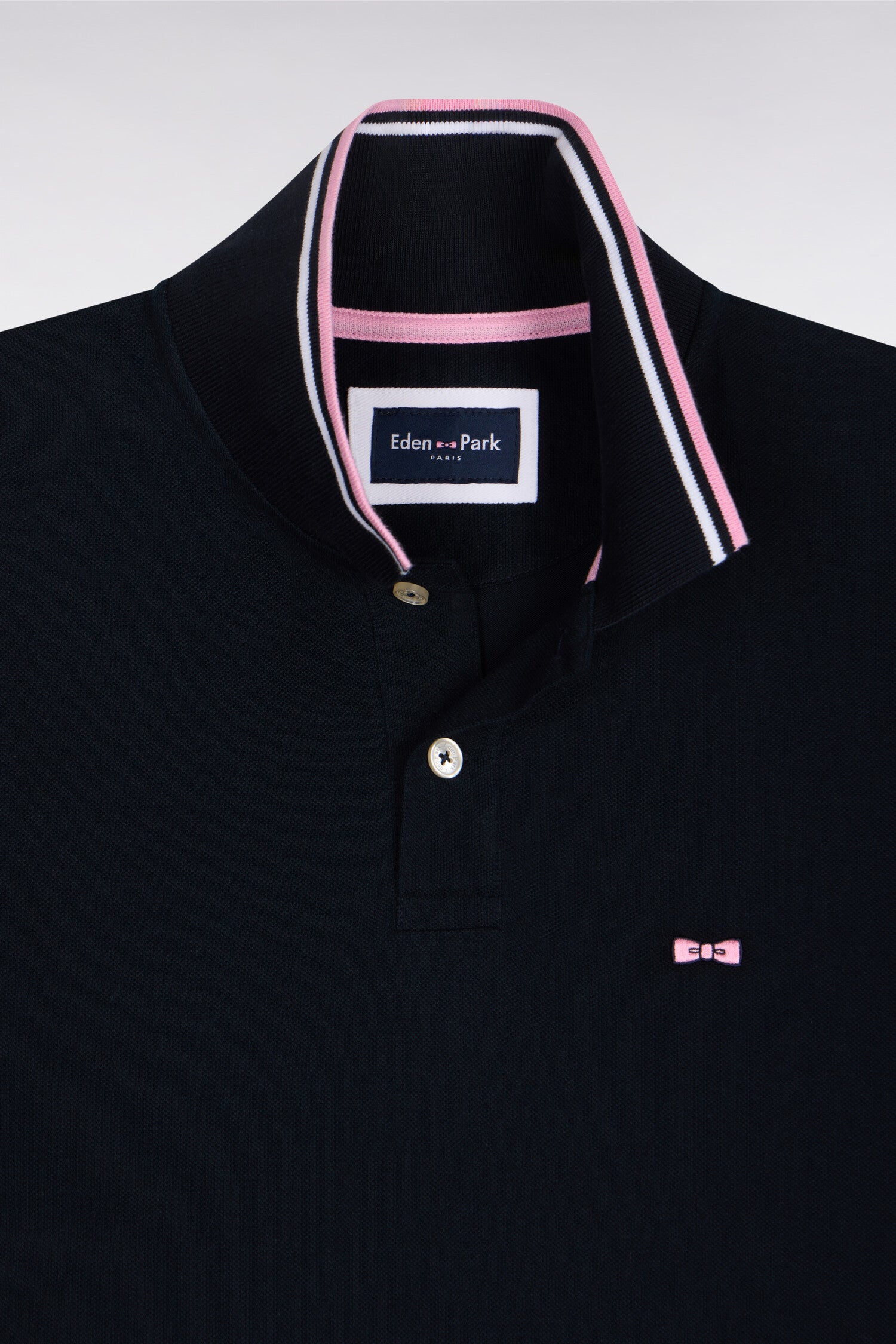 Polo manches courtes en coton marine détails rayés coupe regular