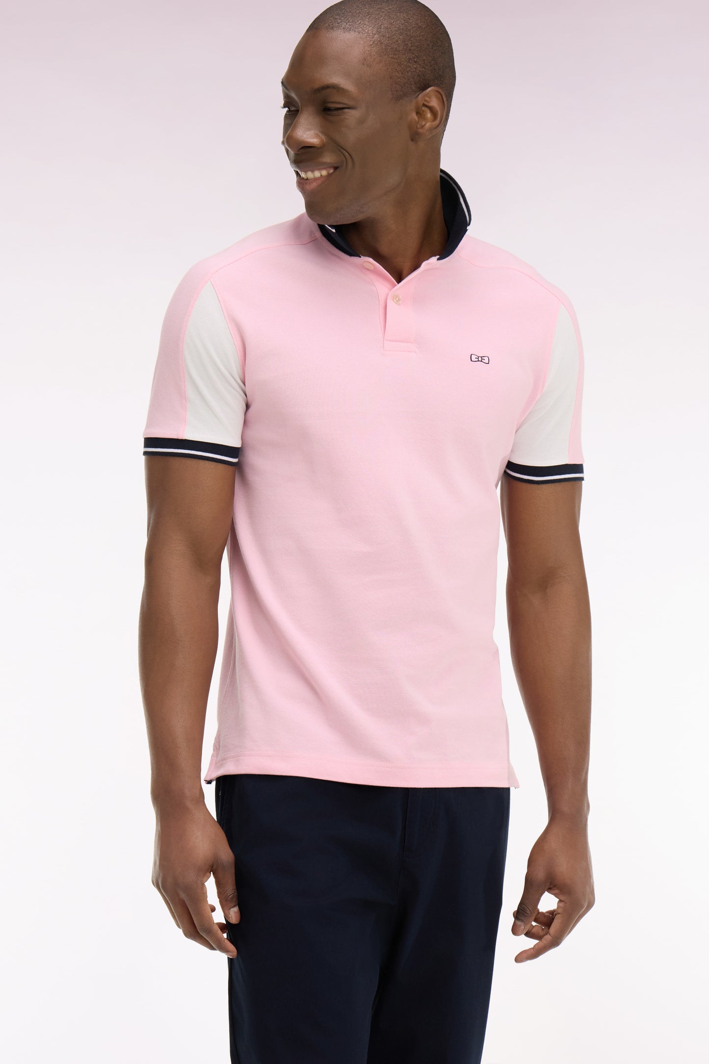 Polo à manches courtes en coton rose brodé coupe regular