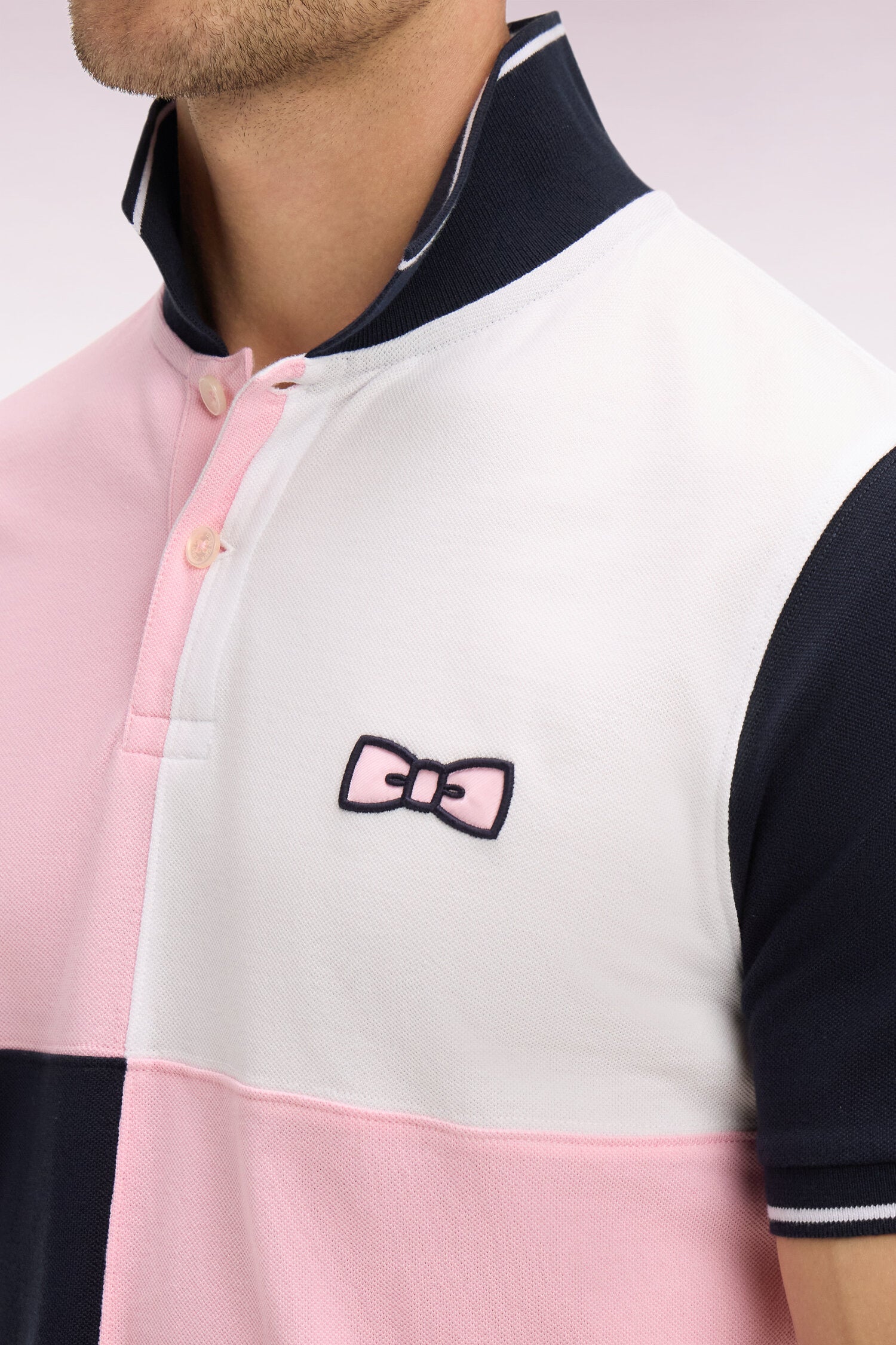 Polo à manches courtes en coton rose à cadrans coupe regular