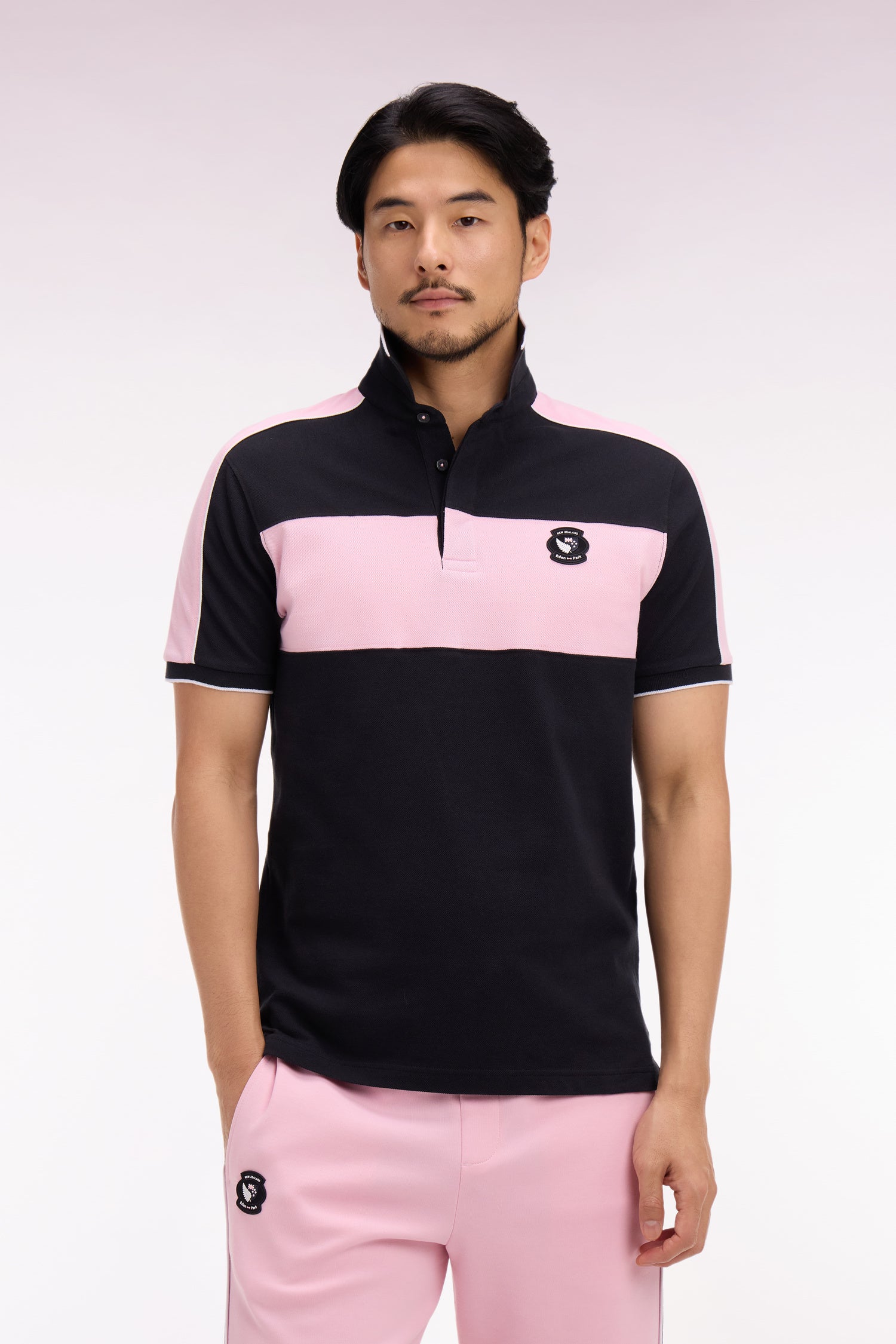 Polo à manches courtes en coton noir et rose New Zealand coupe regular