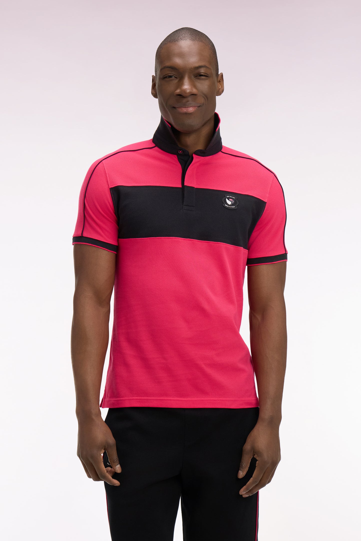 Polo à manches courtes en coton fuchsia et noir New Zealand coupe regular