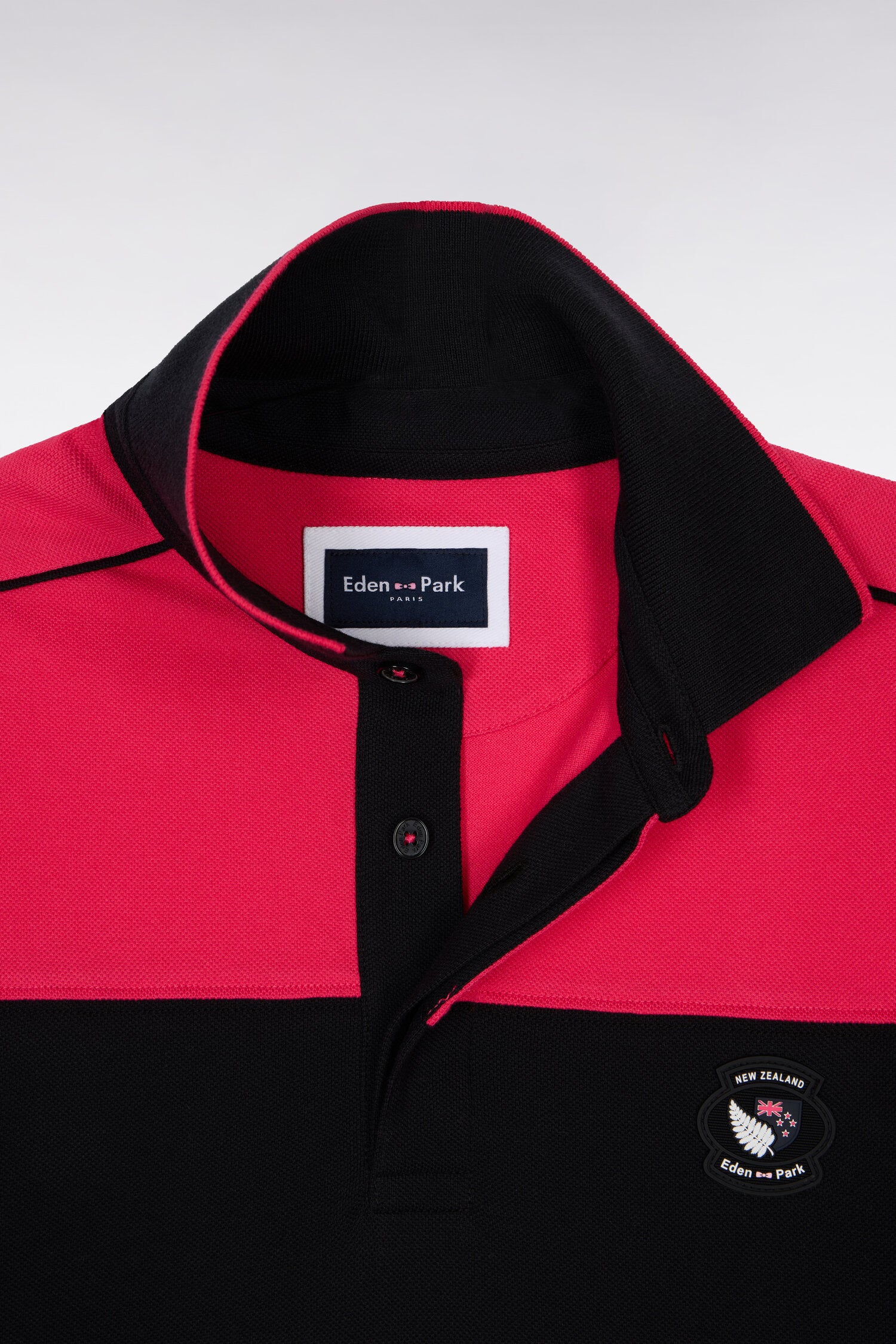 Polo à manches courtes en coton fuchsia et noir New Zealand coupe regular