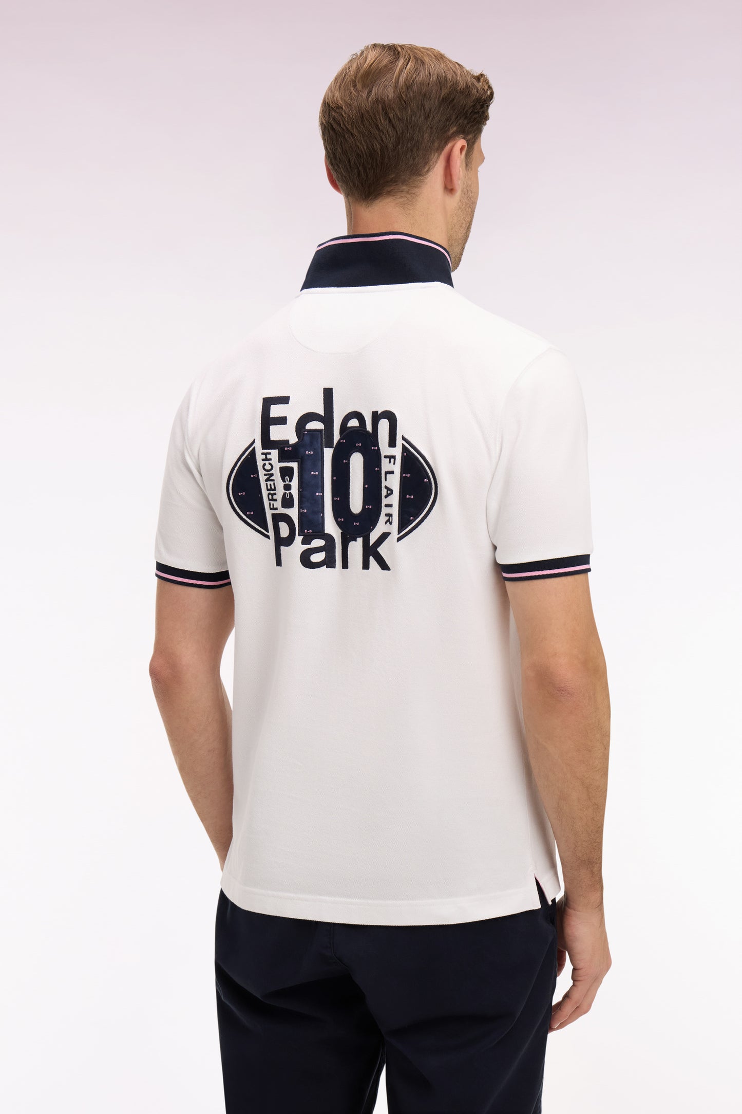 Short-sleeved polo shirt in white cotton pique with navy embroidery
