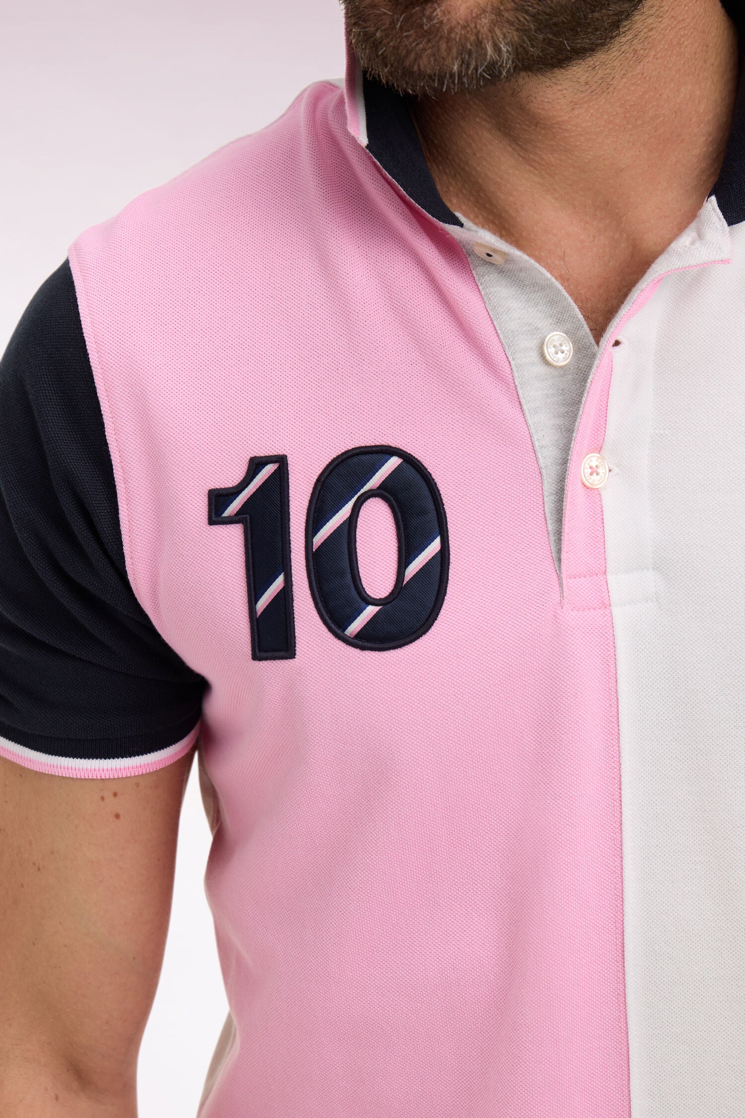 Polo à manches courtes XV de France en coton rose à découpes cadran