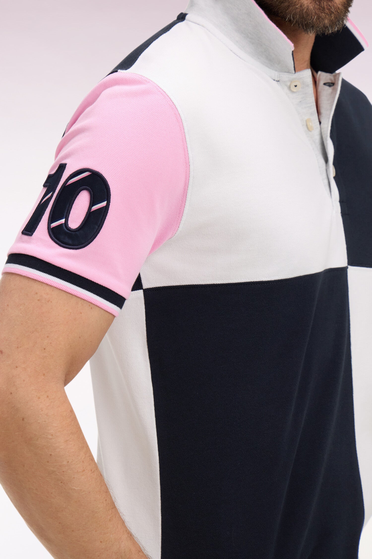 Polo à manches courtes XV de France en coton rose à découpes cadran