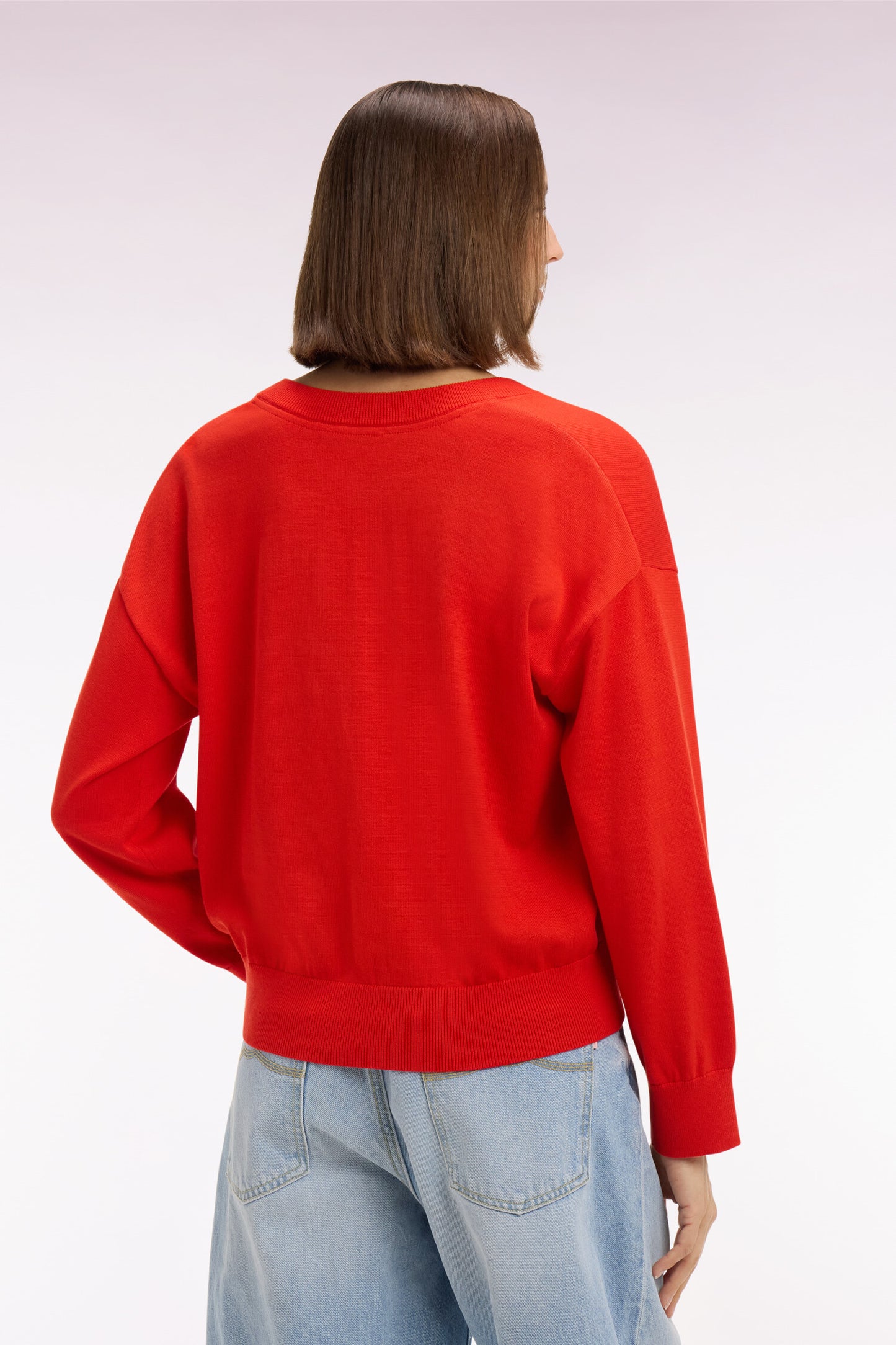 Pull-over à col V en coton rouge coupe oversized