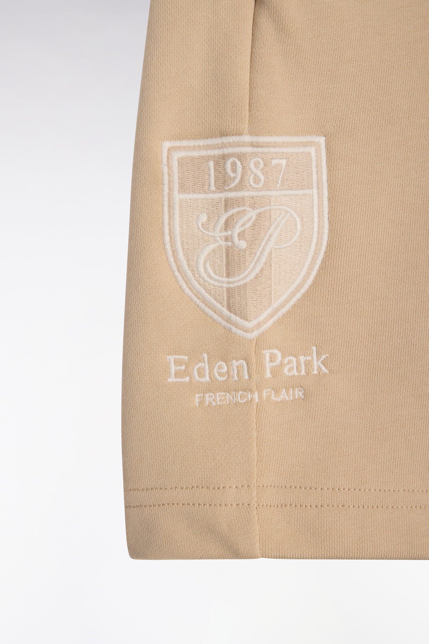shorts in fleece cotton beige with embroidery blason