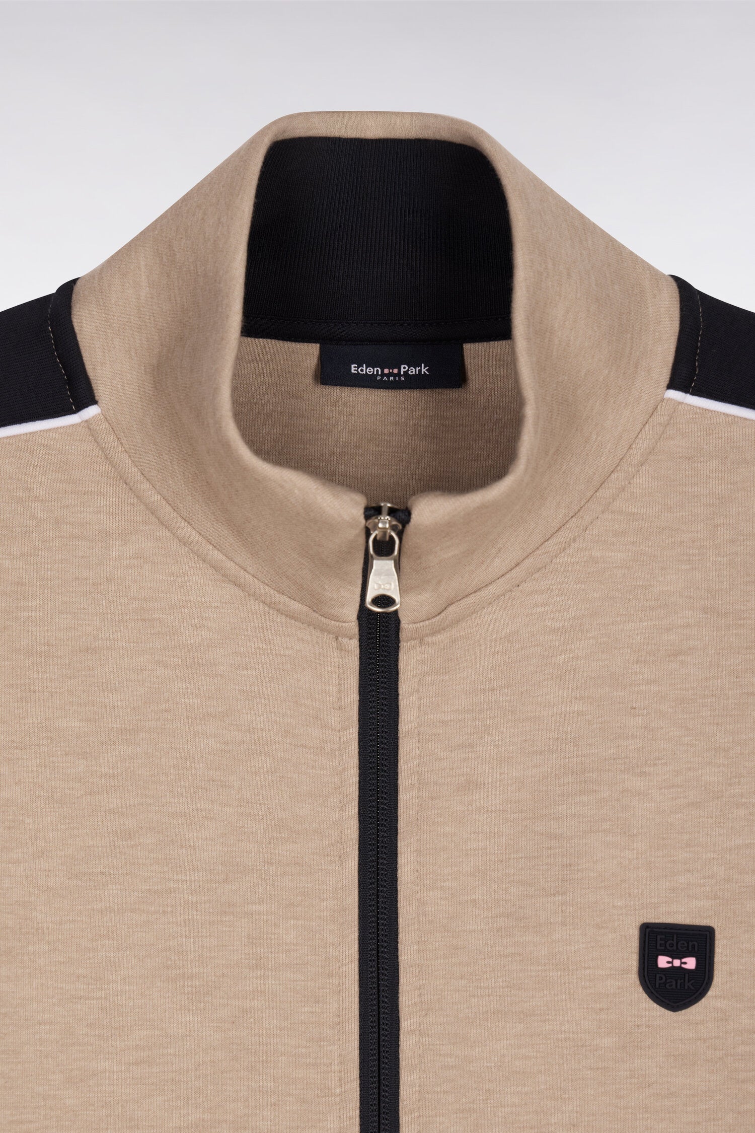 Sweatshirt zippé en interlock beige à découpes contrastées