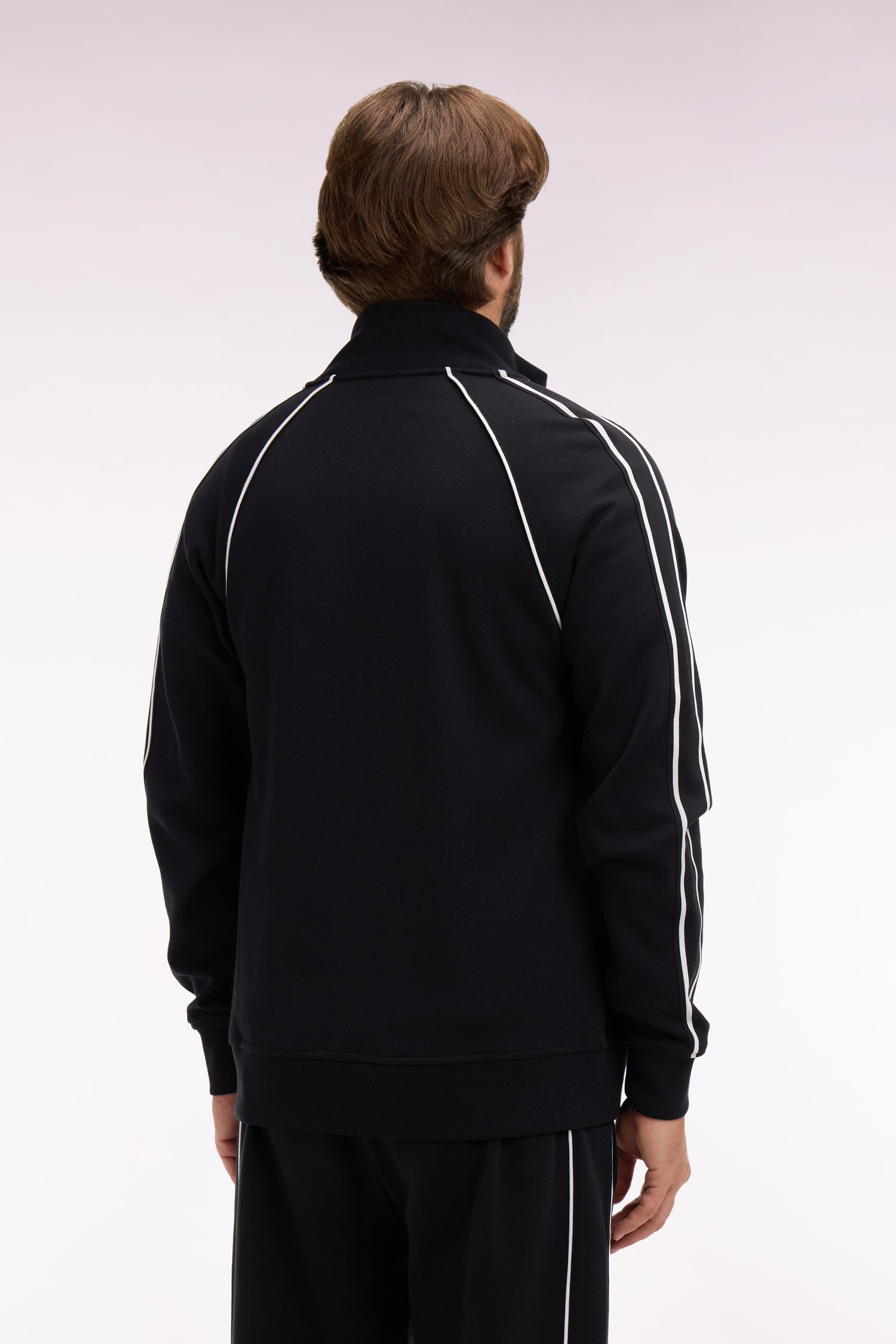 Sweatshirt zippé en interlock noir découpes ruban coupe regular