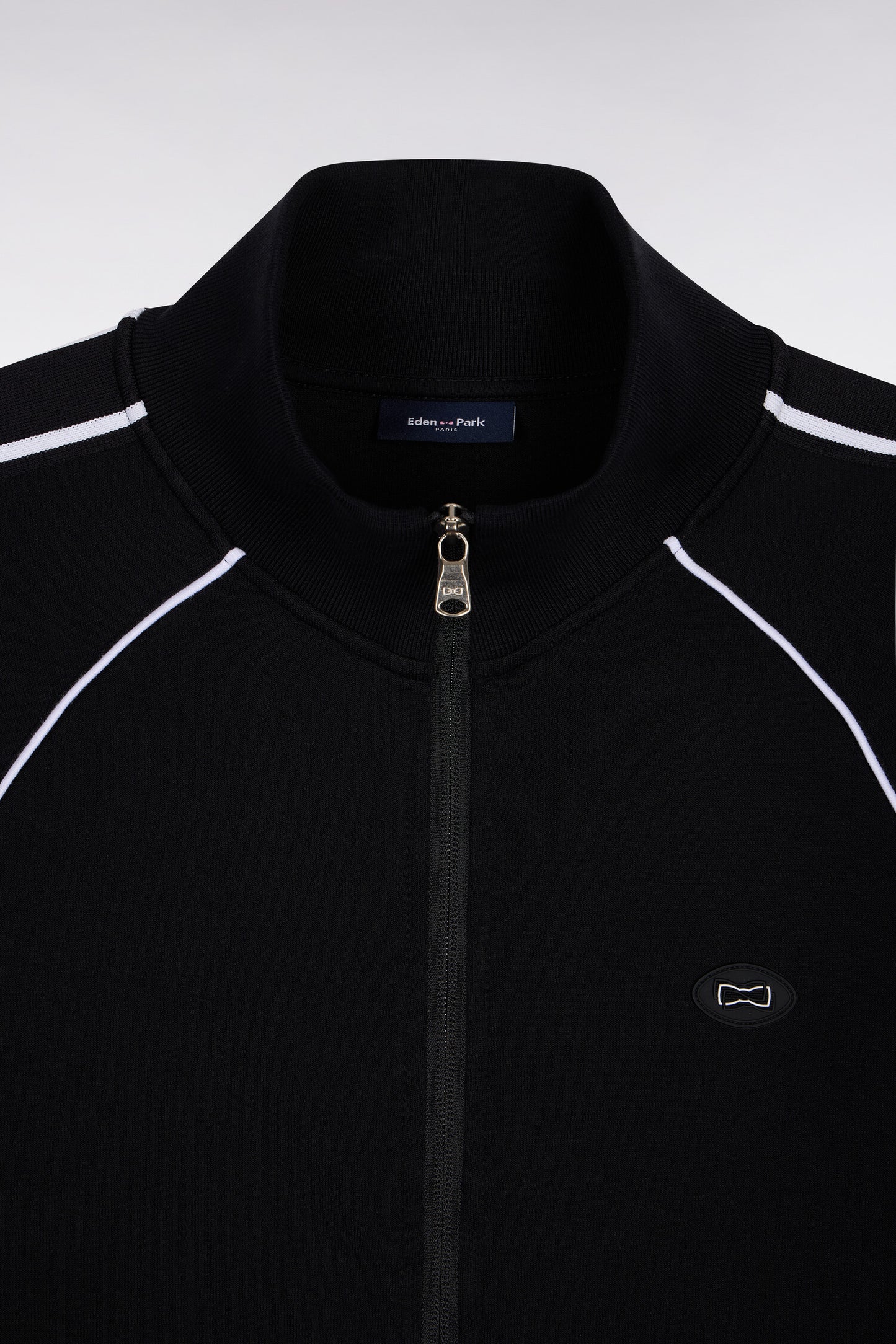 Sweatshirt zippé en interlock noir découpes ruban coupe regular