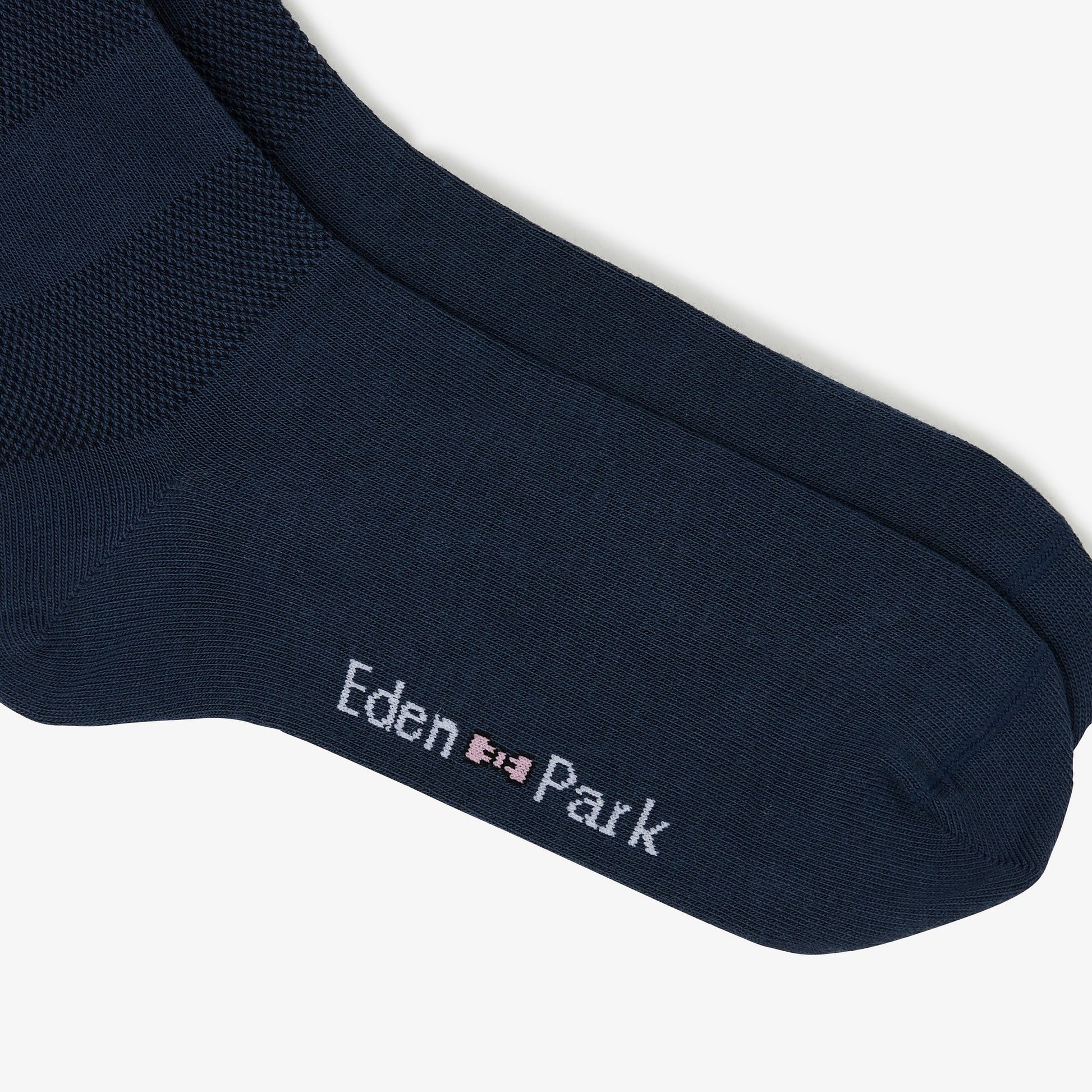 Paire de chaussettes bleues rayées unies