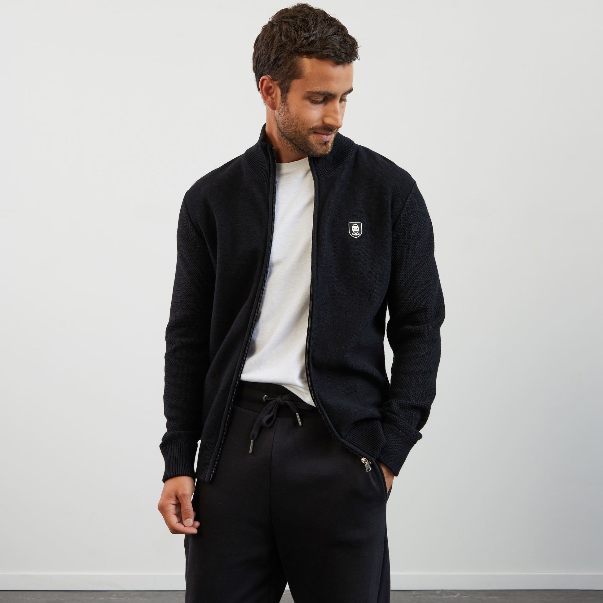 Cardigan noir zippé en jeu de mailles