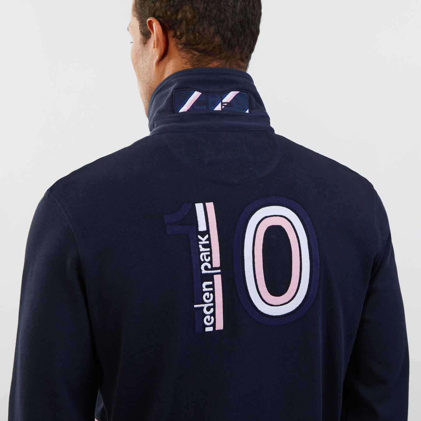 Dark blue circle rugby shirt with embroidered 10 on the back