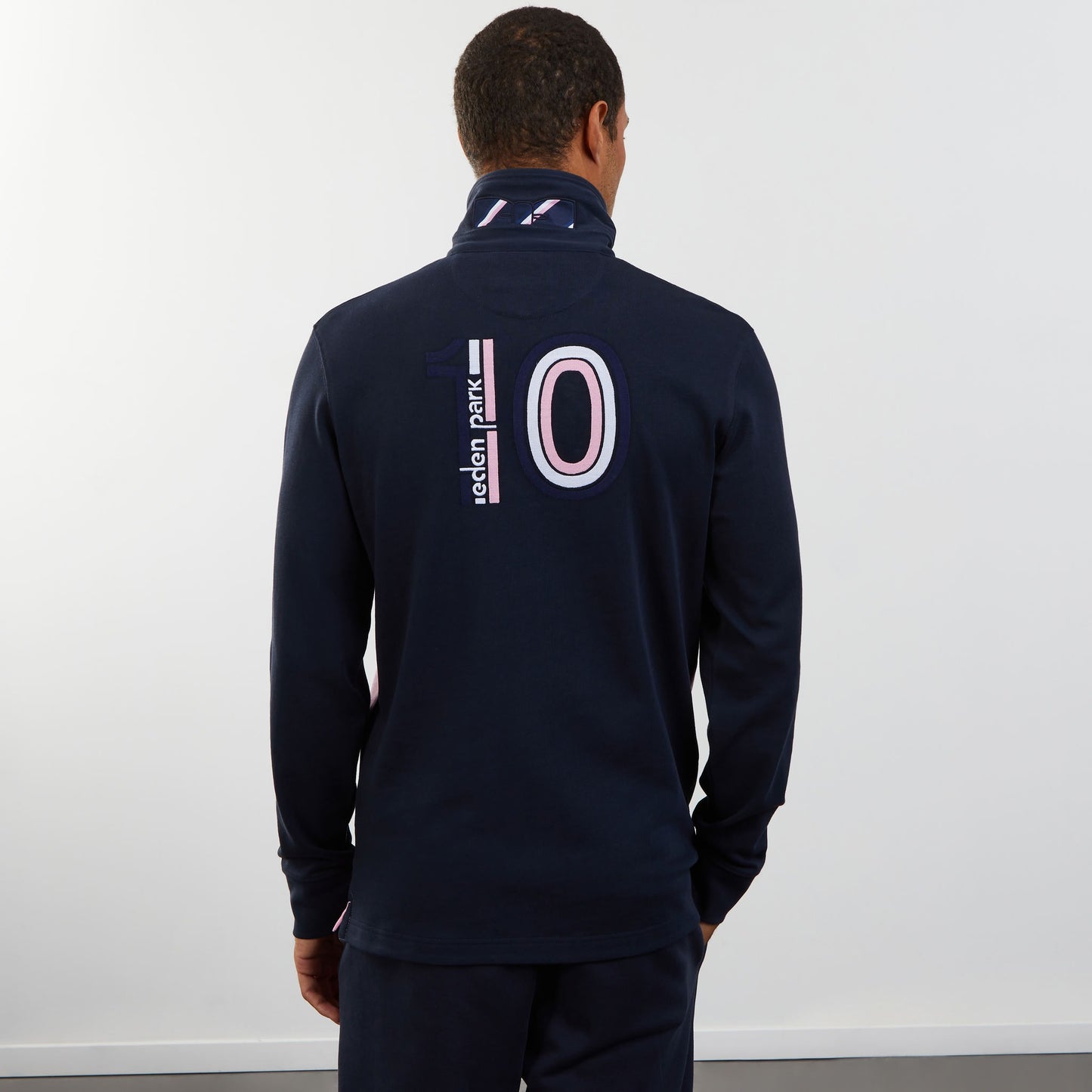 Dark blue circle rugby shirt with embroidered 10 on the back