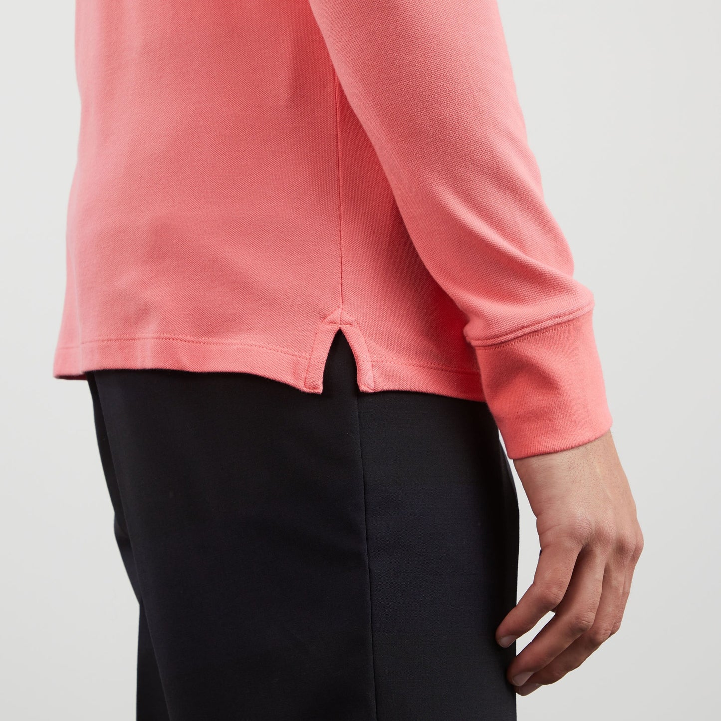 Pink long-sleeved polo shirt