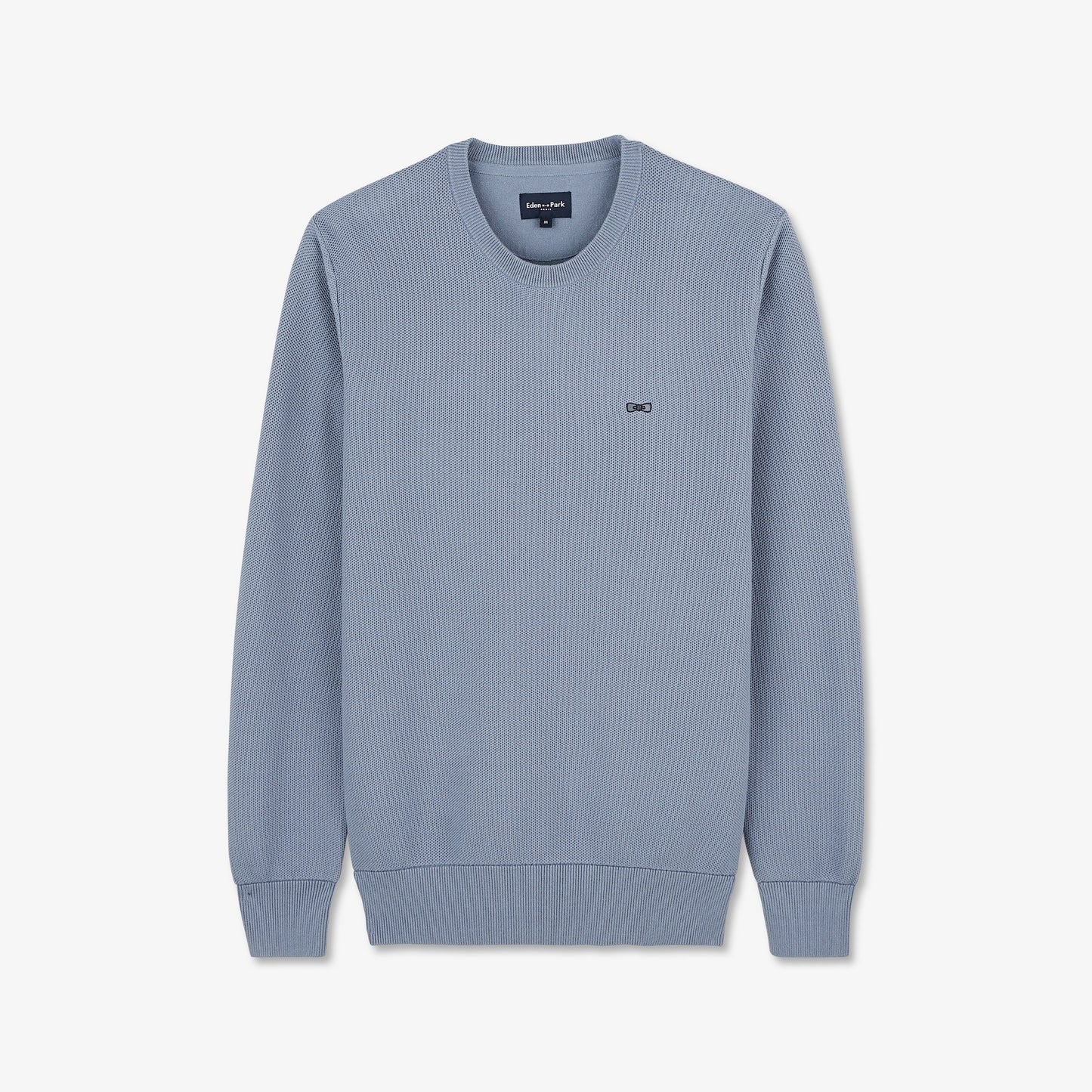 Grey jumper in decorative cable knit
