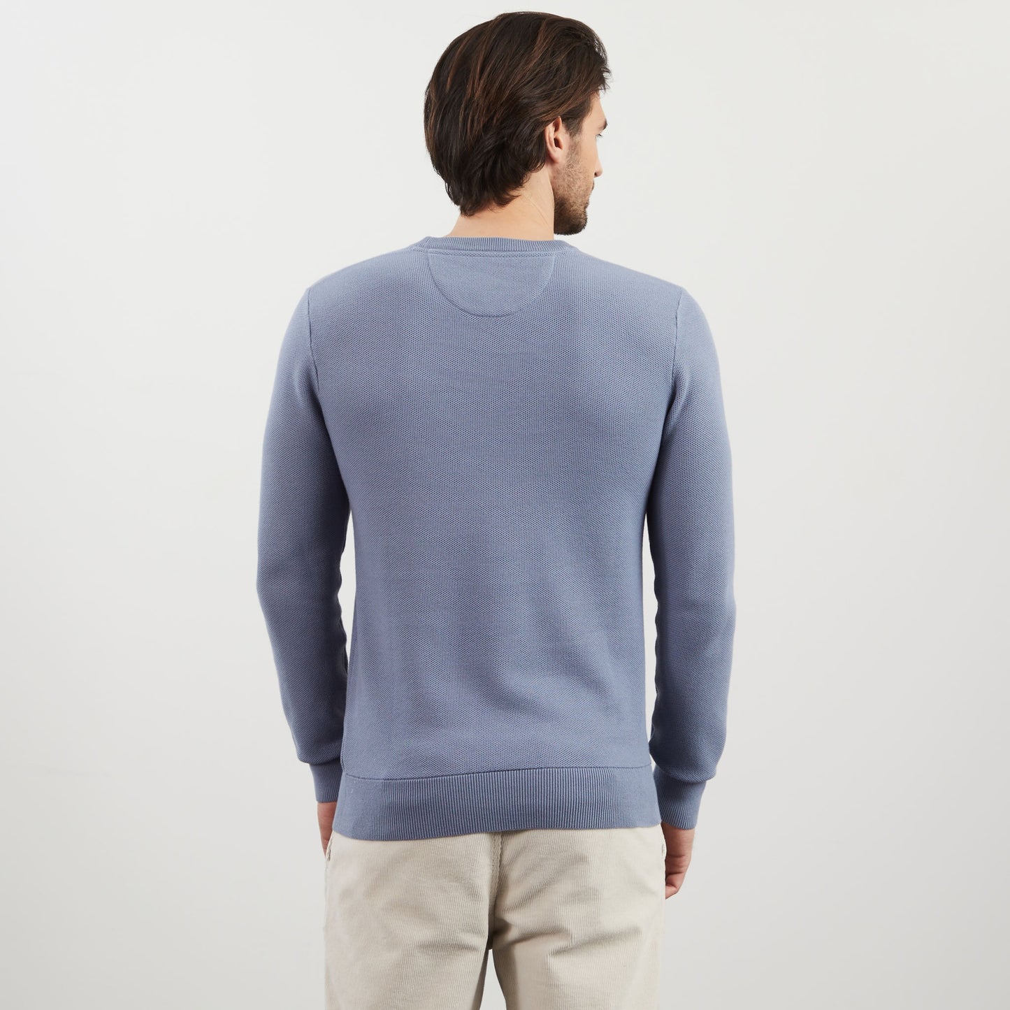 Grey jumper in decorative cable knit