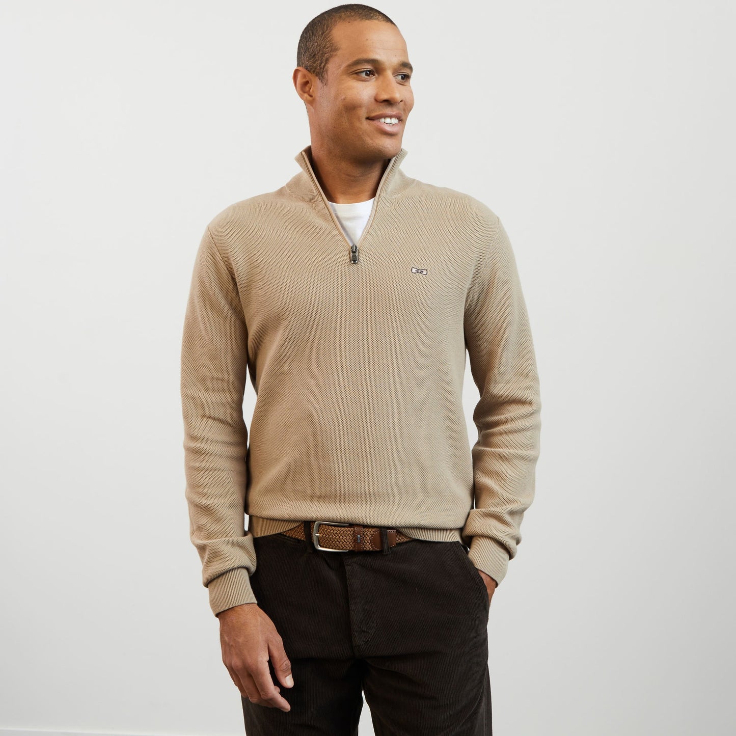 Beige zip-neck jumper in decorative cable knit