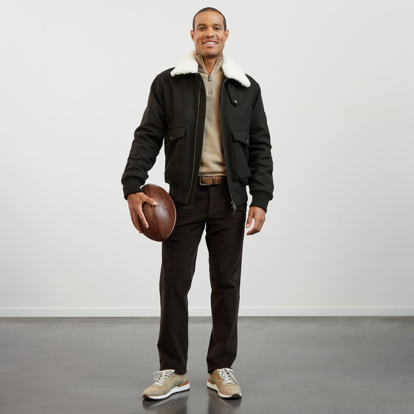 Beige zip-neck jumper in decorative cable knit