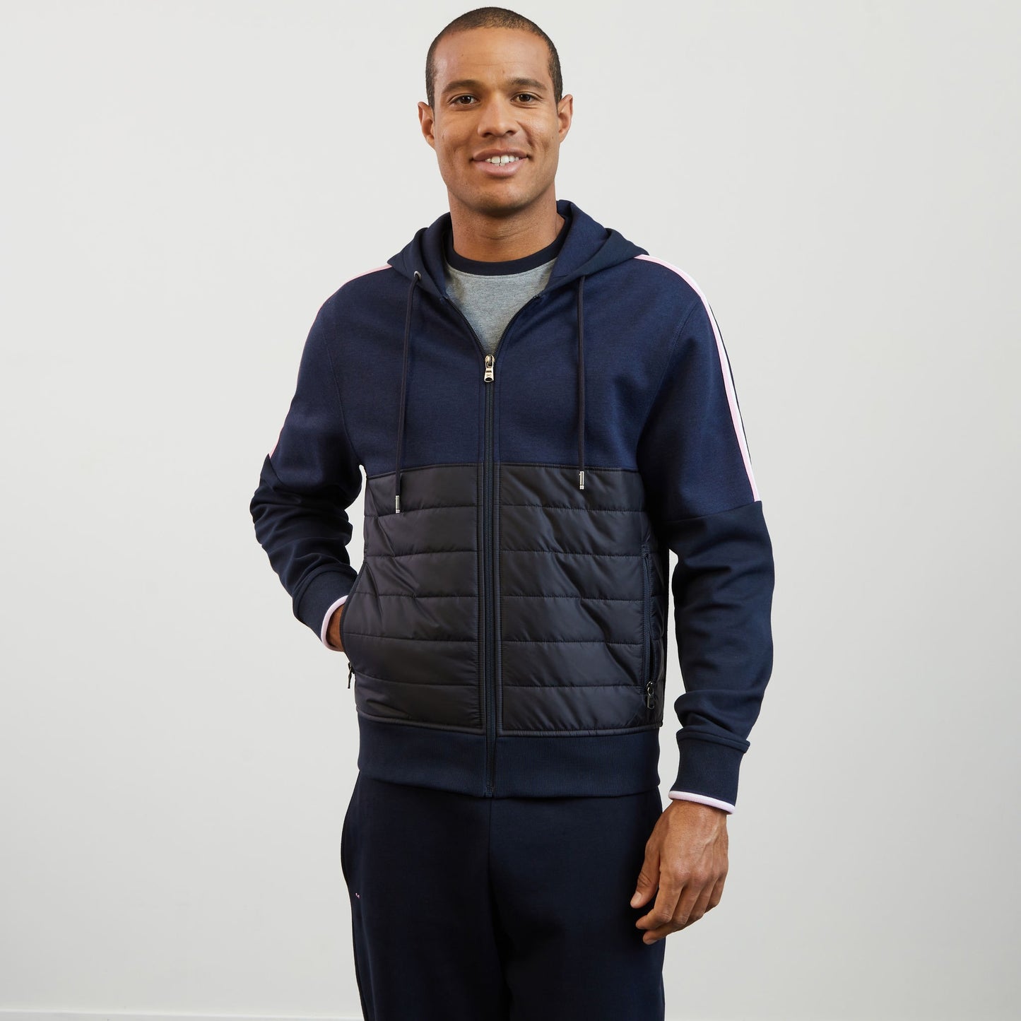 Sweat bleu foncé bimatière à détails tricolores