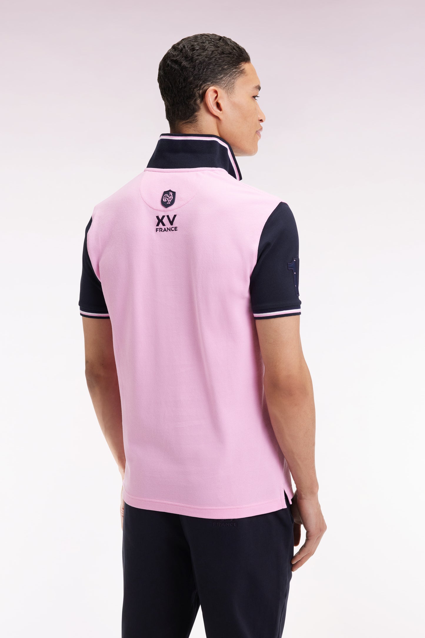 Polo manches courtes rose et marine finitions tricolores coupe droite