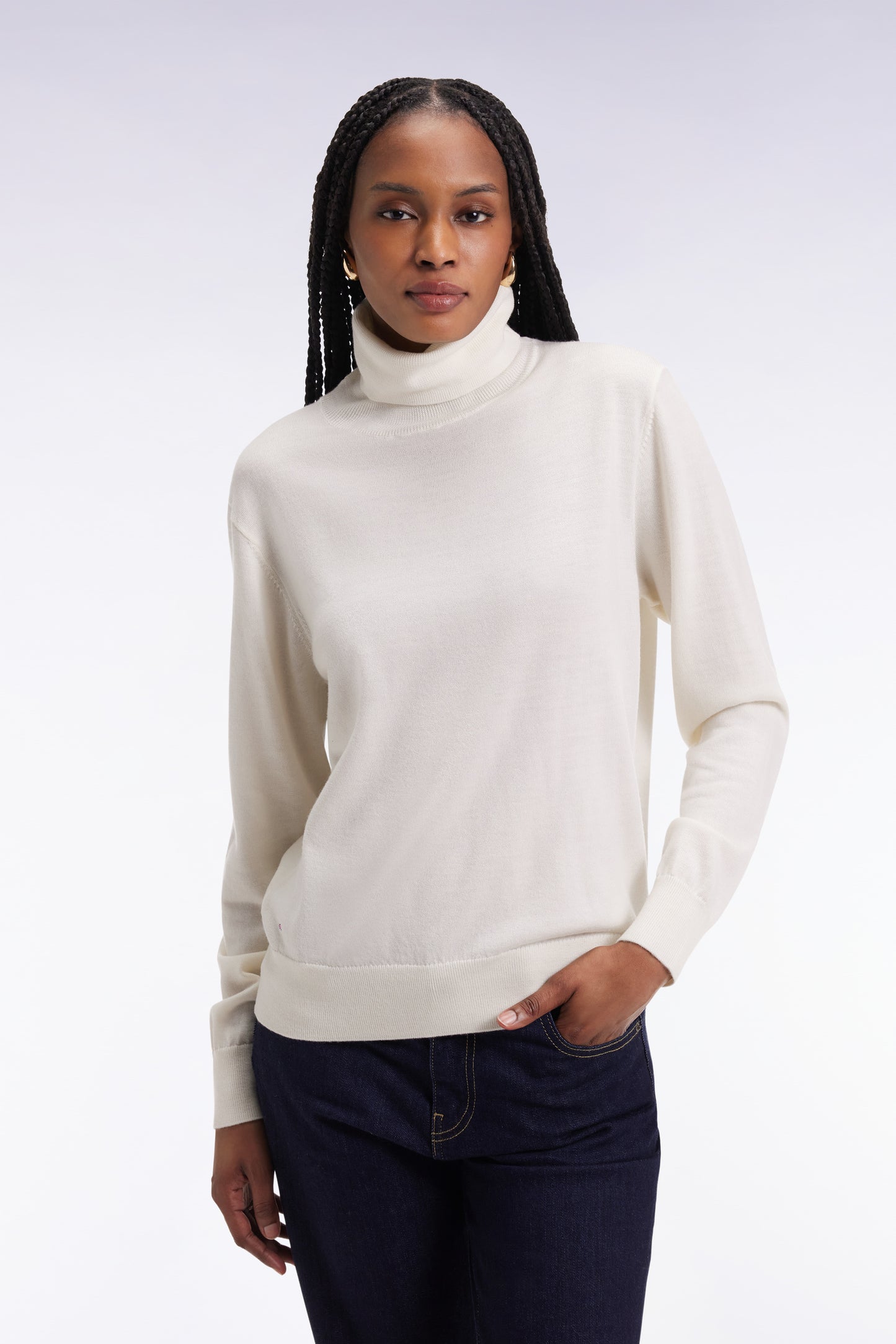 Pull à col roulé en laine mérinos écru