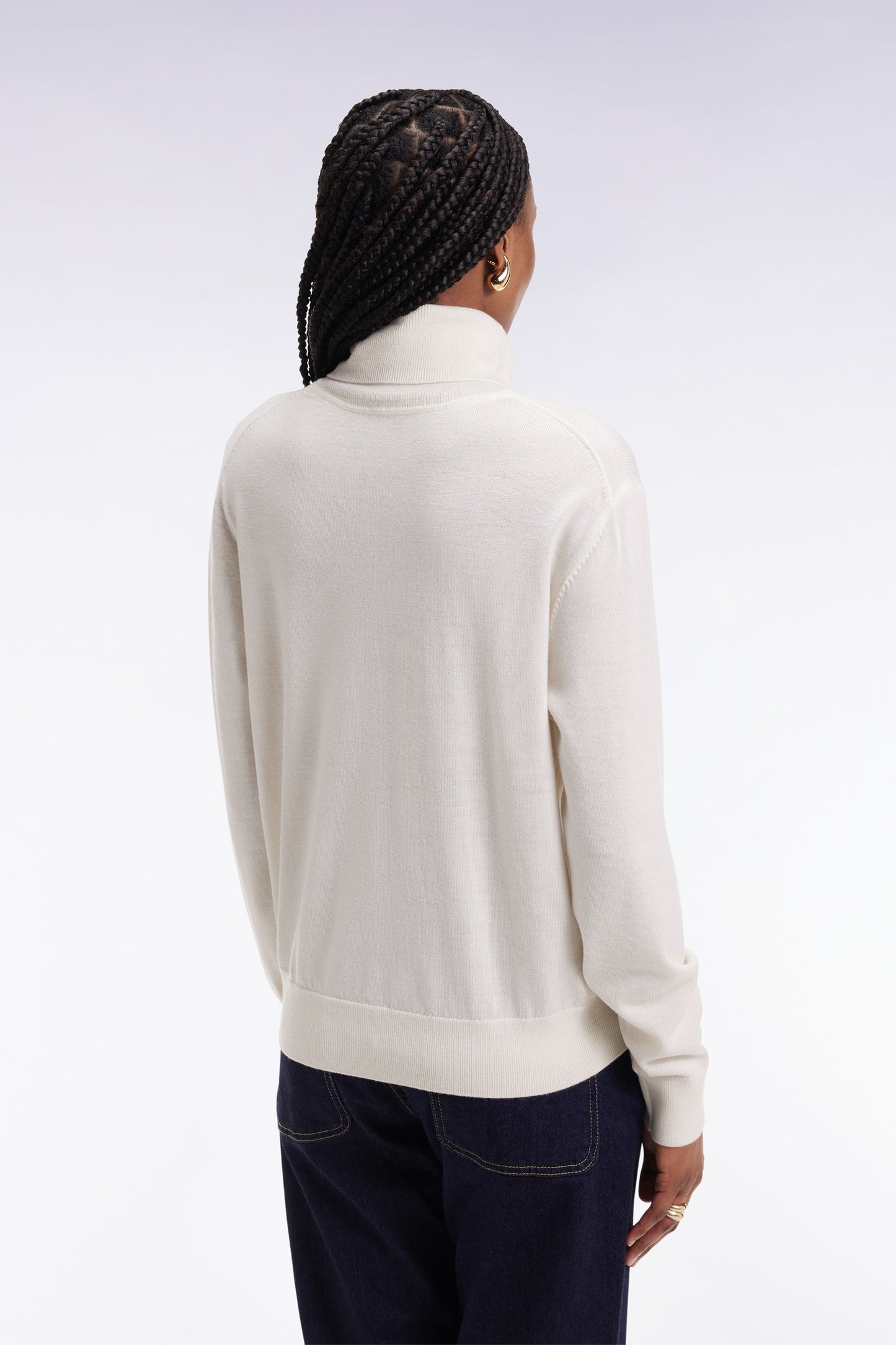 Pull à col roulé en laine mérinos écru