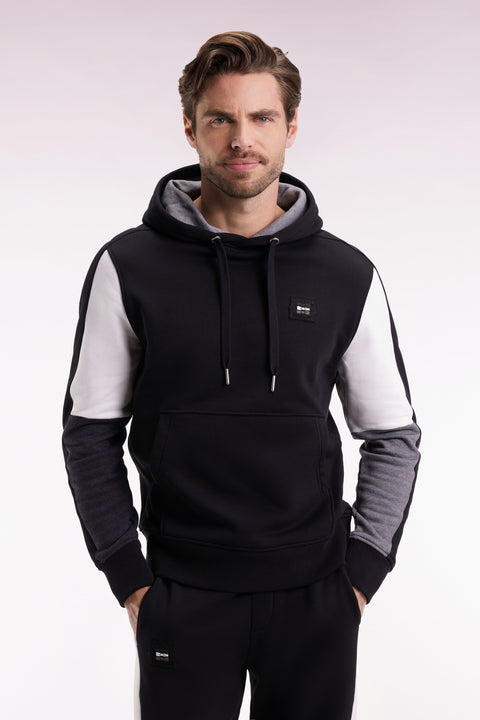 Sweatshirt à capuche noir découpes manches contrastées - Image 1