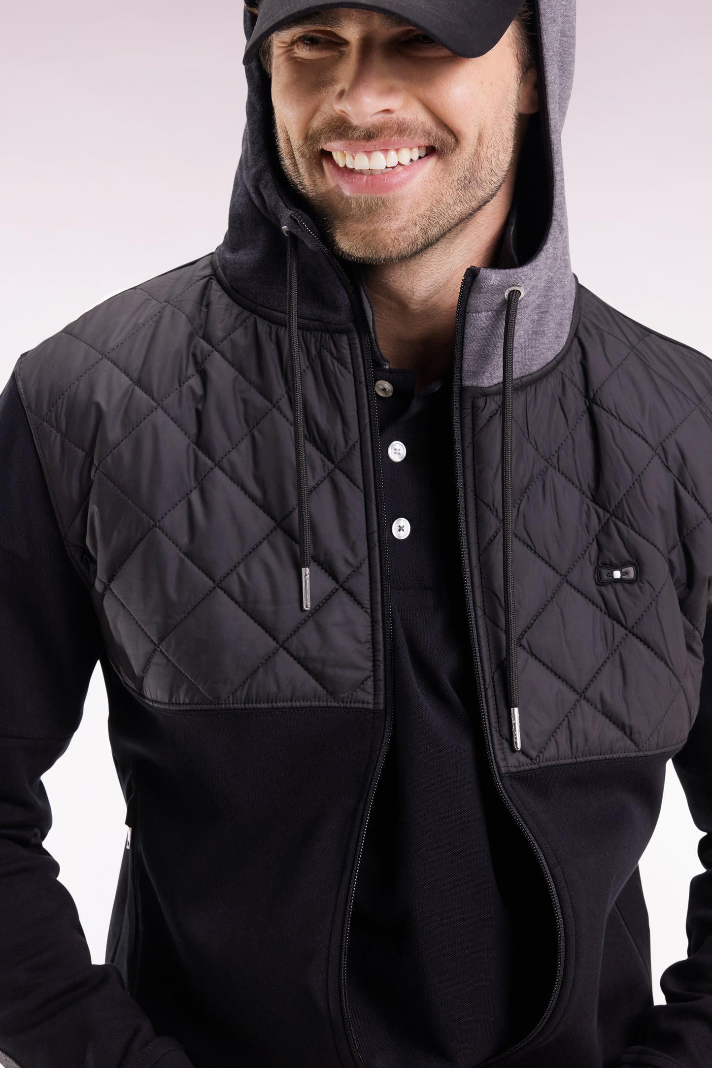 Sweatshirt zippé en interlock bimatière matelassé noir et gris