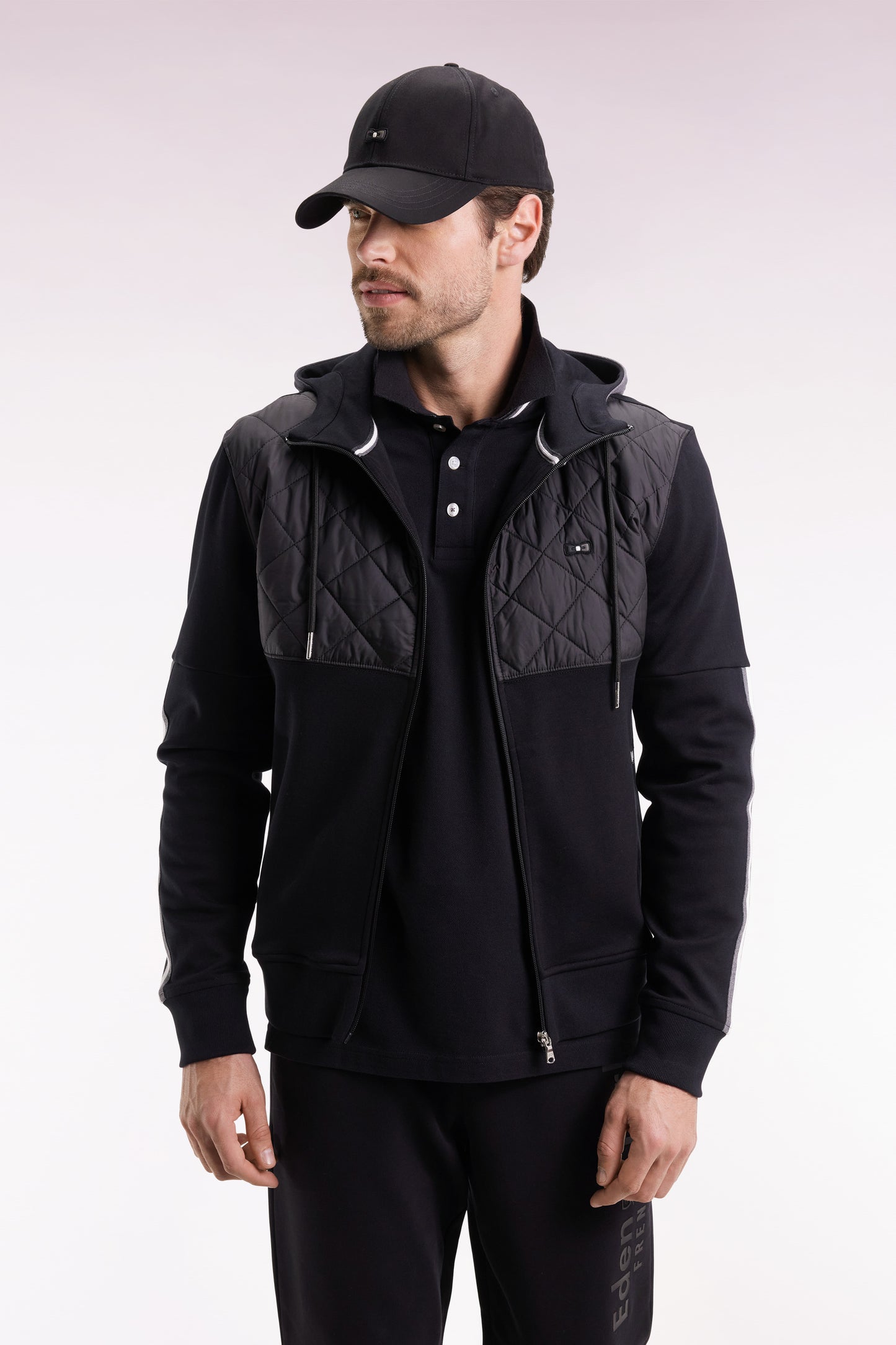 Sweatshirt zippé en interlock bimatière matelassé noir et gris