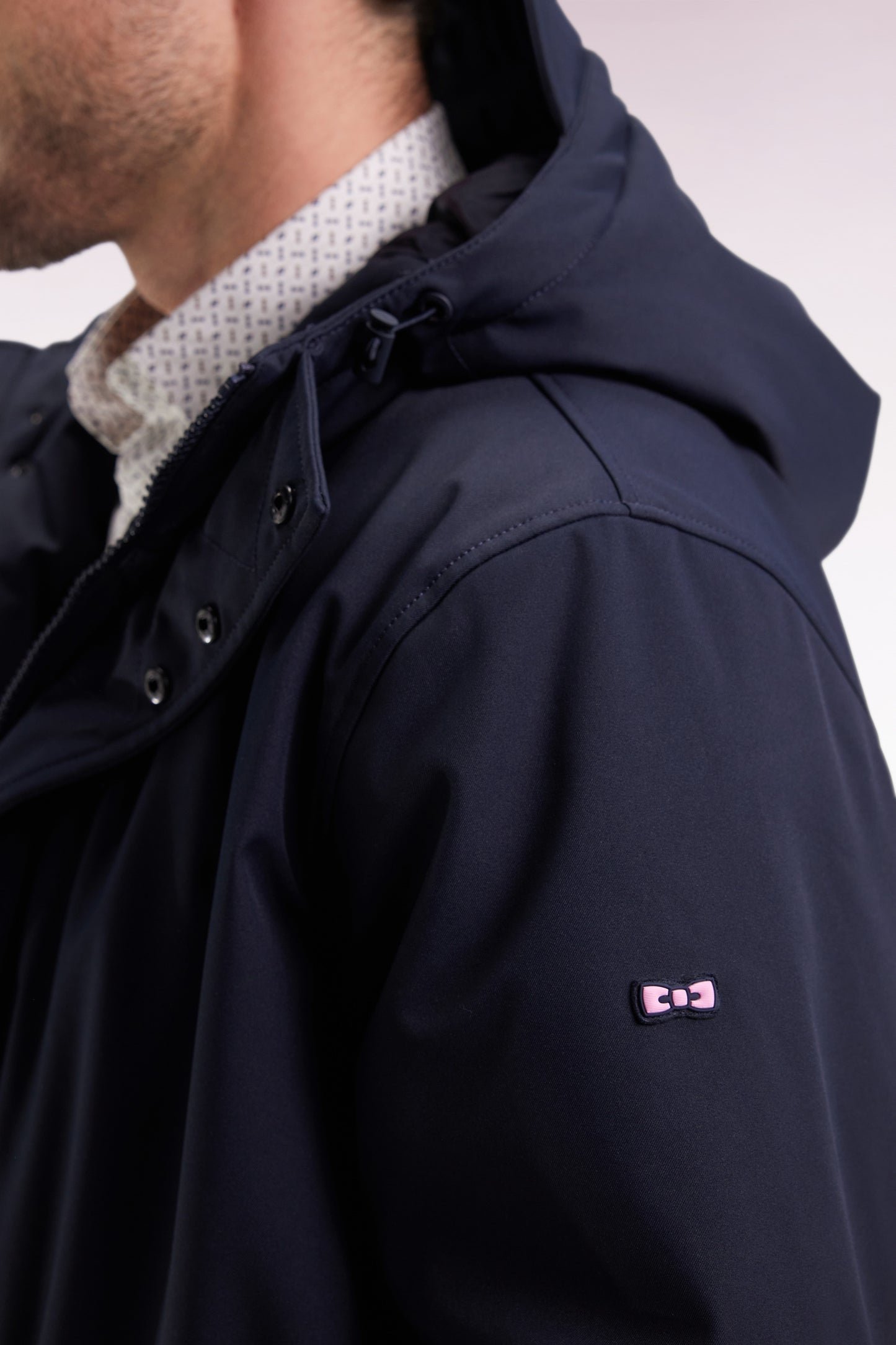 Parka longue en nylon marine à capuche intégrée