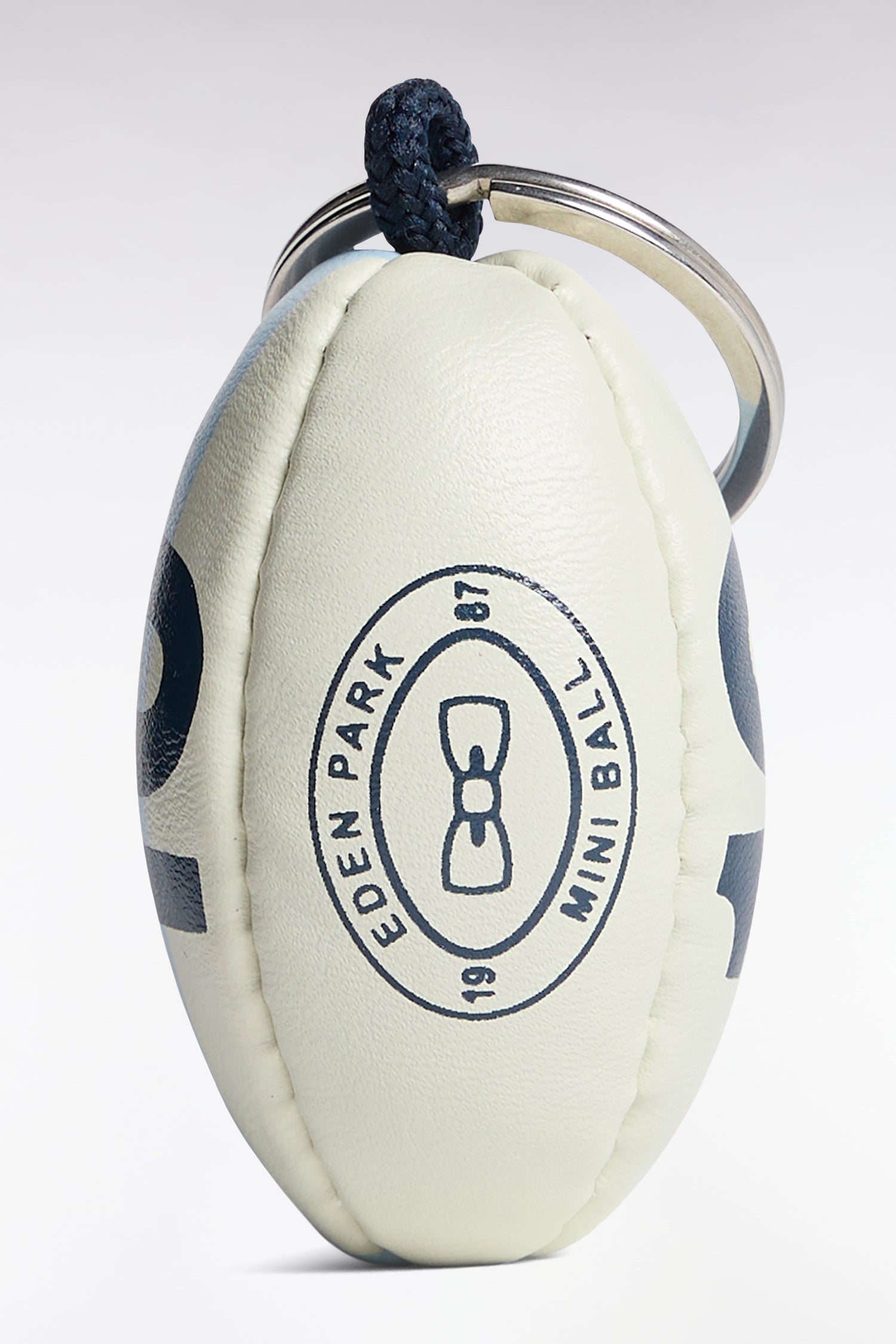 Porte-clés caoutchouc ballon de rugby numéro 10 ciel