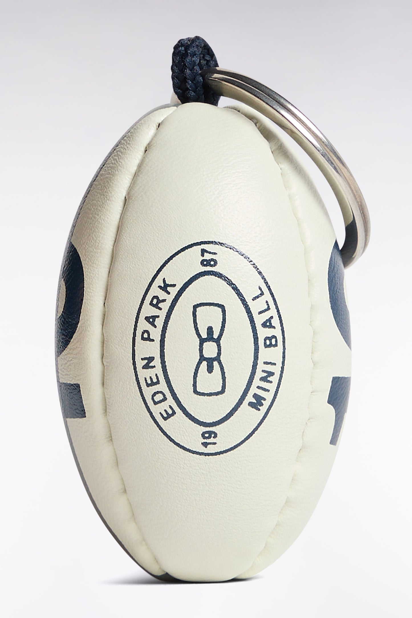 Porte-clés caoutchouc ballon de rugby numéro 10 kaki