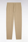 Pantalon à taille élastiquée en nylon stretch technique beige coupe Modern