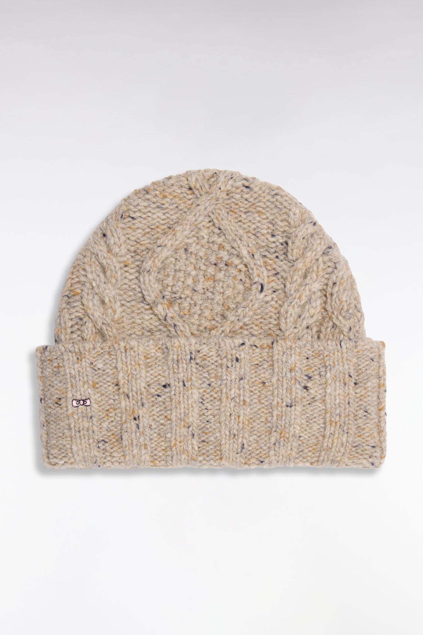 Bonnet en maille torsadée beige